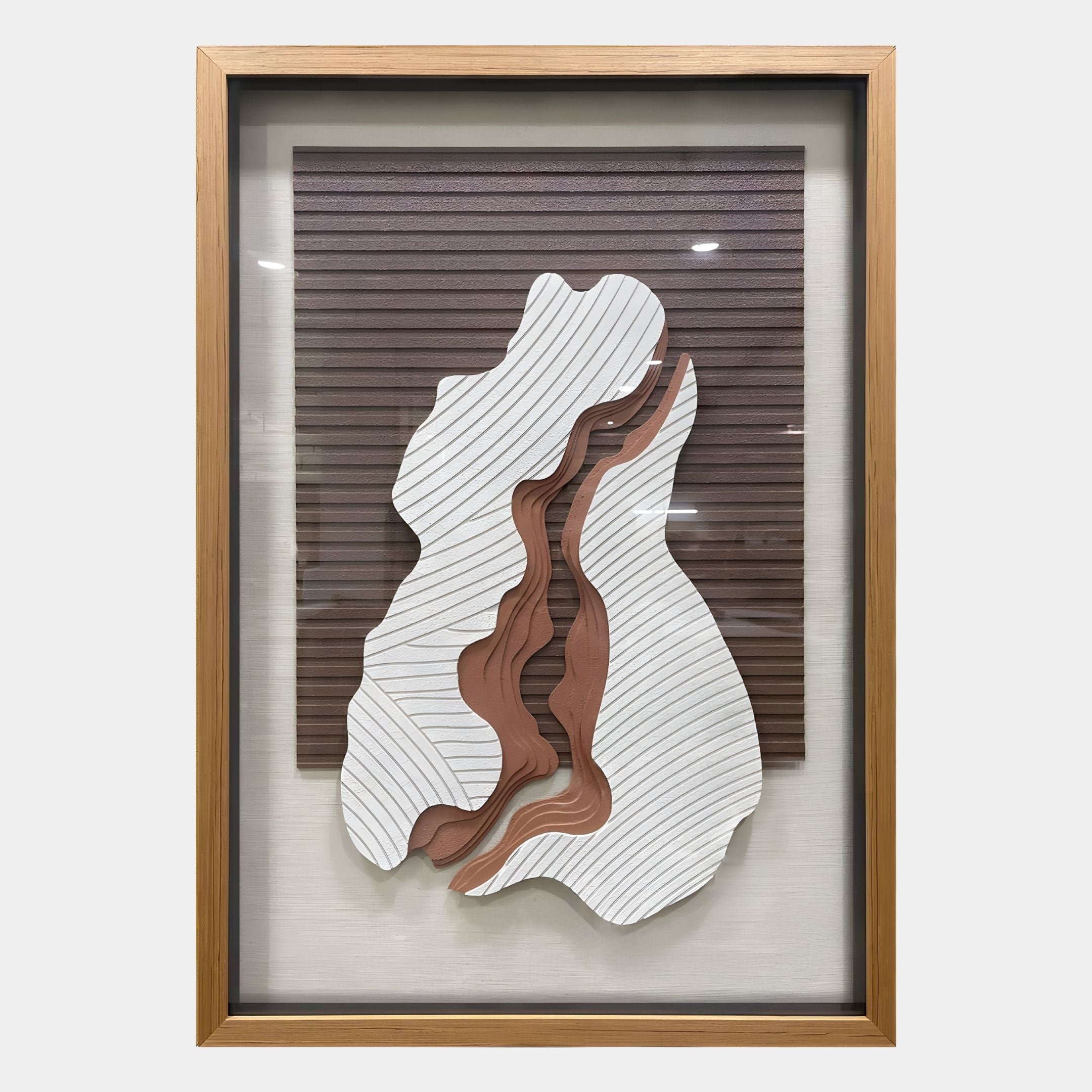 The Stratavine Clay & White Layered Wood Carving 3D Wall Art by Giant Sculptures features abstract, wavy cutouts in white and brown with black lines on a wood-textured background for a striking dimensional effect.