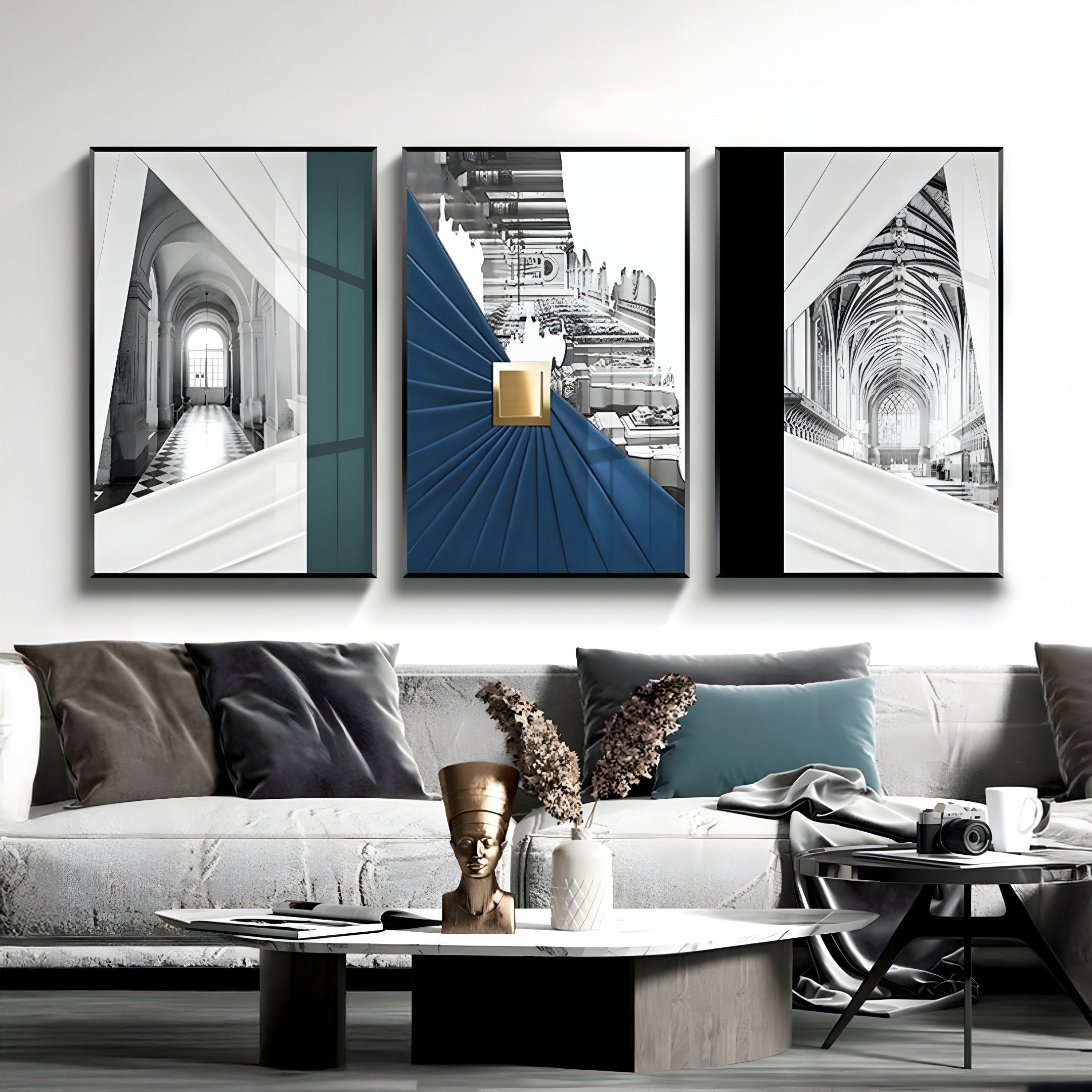 The Arclustre Black & White Cathedral Vault 3D Wall Art by Giant Sculptures hangs above a grey sofa with pillows, while a coffee table with decor completes this stylish, modern architectural-themed living room.