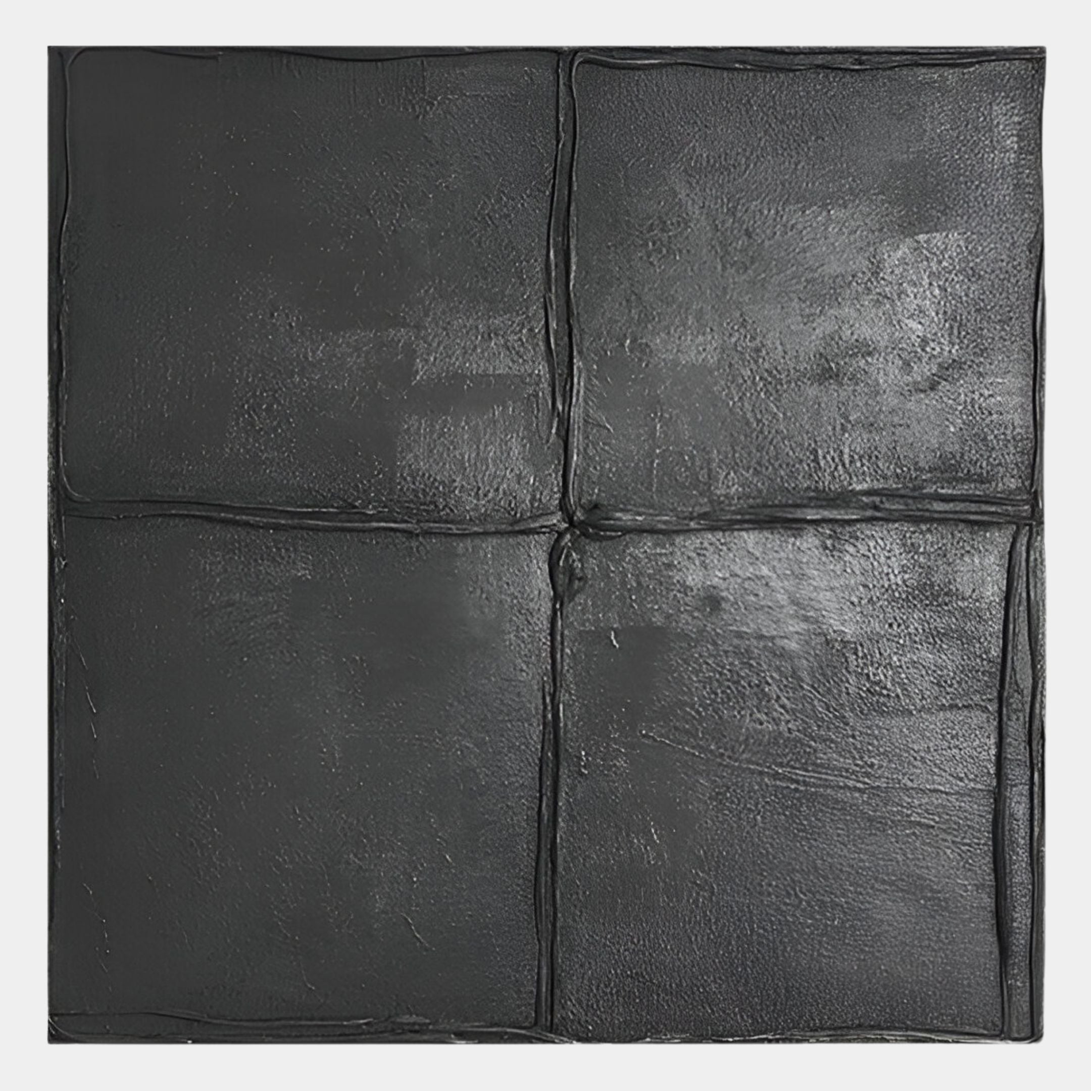 The Terracrecta Charcoal Black Painted Textured Square 3D Wall Art by Giant Sculptures features four uneven quadrants with raised seams and a slightly glossy, rough finish—ideal for modern wabi-sabi decor.
