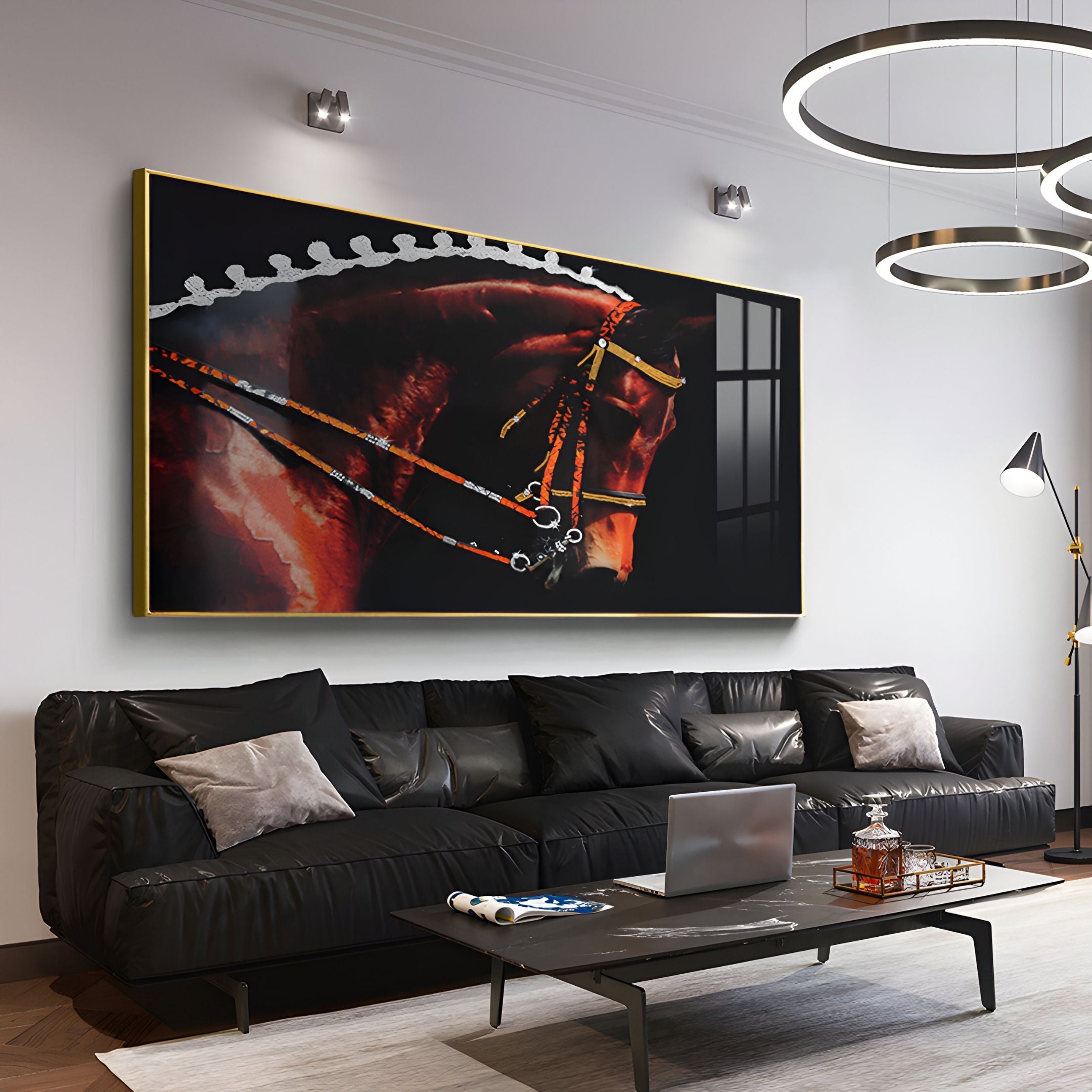 A modern living room with a black leather sofa, neutral pillows, a laptop on the coffee table, and the Auravalor Red Stallion Crystal Porcelain 3D Wall Art by Giant Sculptures above. Contemporary ceiling lights complete the scene.