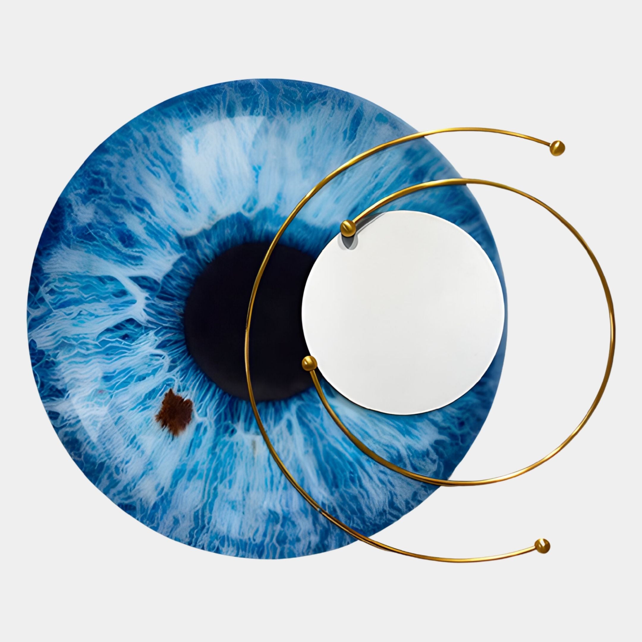 The Aurelios Arctic Blue Iris Crystal Porcelain & Gold Orbit 3D Wall Art by Giant Sculptures features a detailed blue iris with a brown spot, overlaid by a mirror and gold rods for an abstract eye-themed display on a light background.