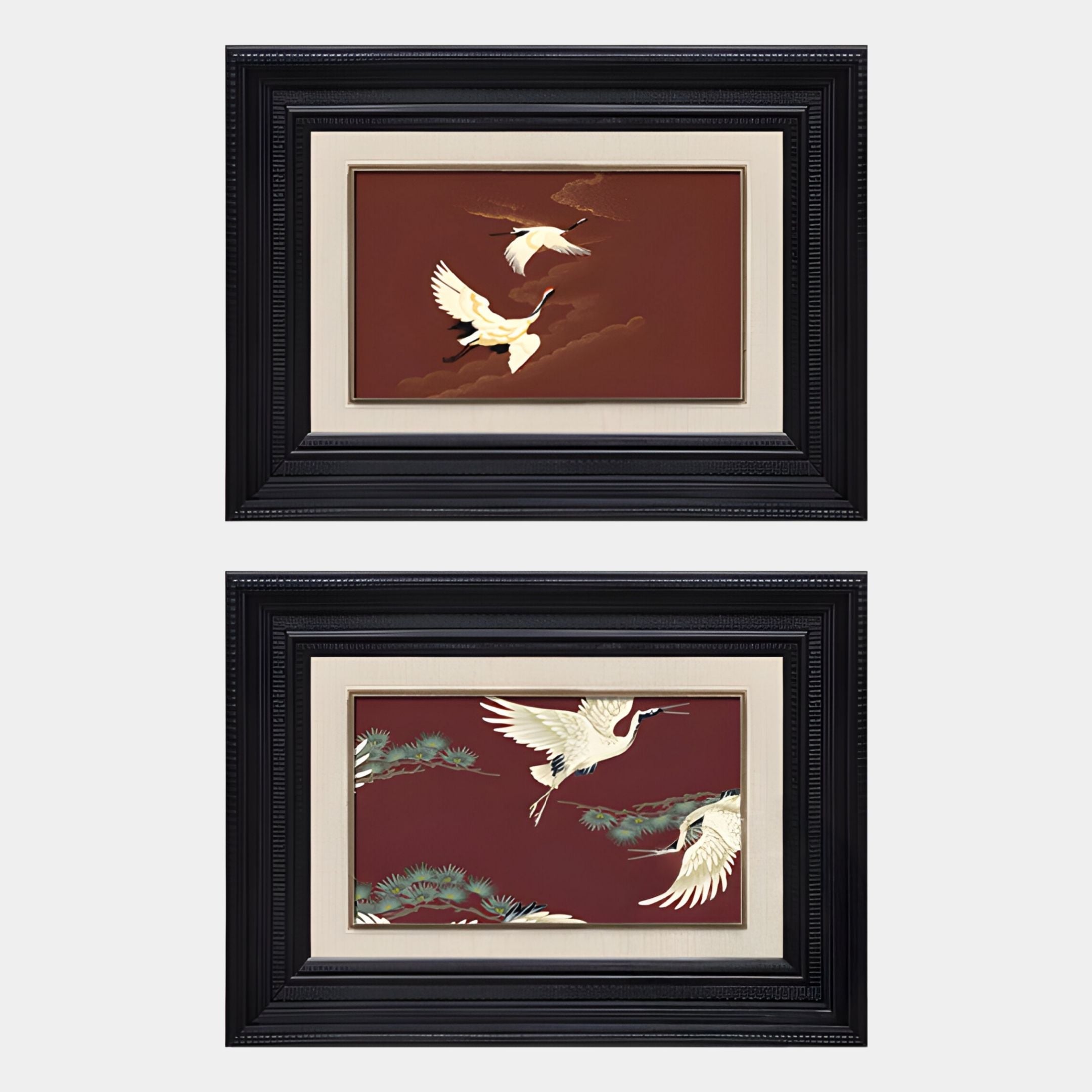 The Kansora Heritage Crane Flight 2-Set Framed Wall Art by Giant Sculptures features elegant crane designs in black frames with beige mats—ideal for adding heritage charm to your home décor.