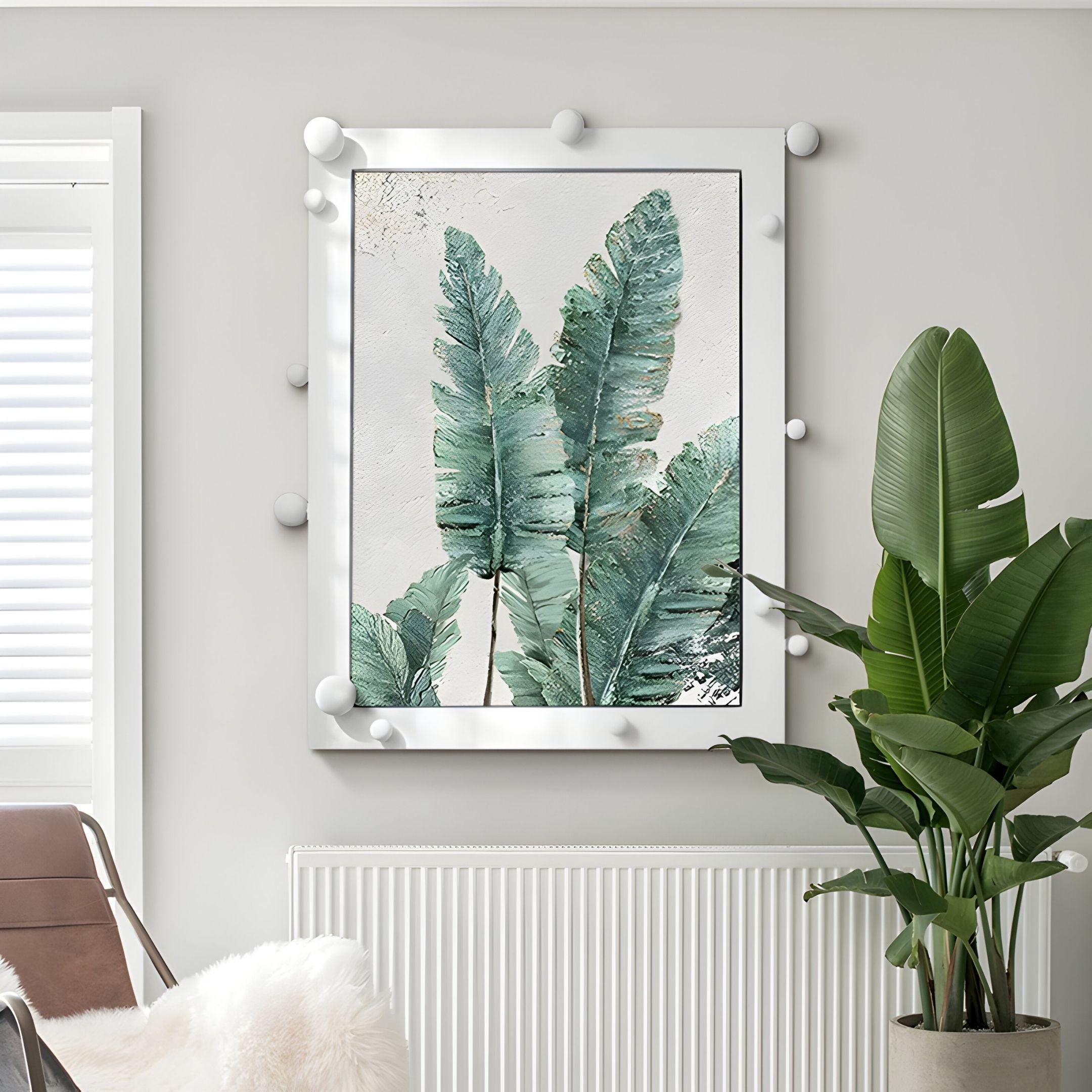 The Verdantia II Green Palm Leaf Textured 3D Wall Art by Giant Sculptures hangs above a white radiator on a light gray wall; a real potted plant nearby echoes its leaves, bringing modern botanical style to the bright room.