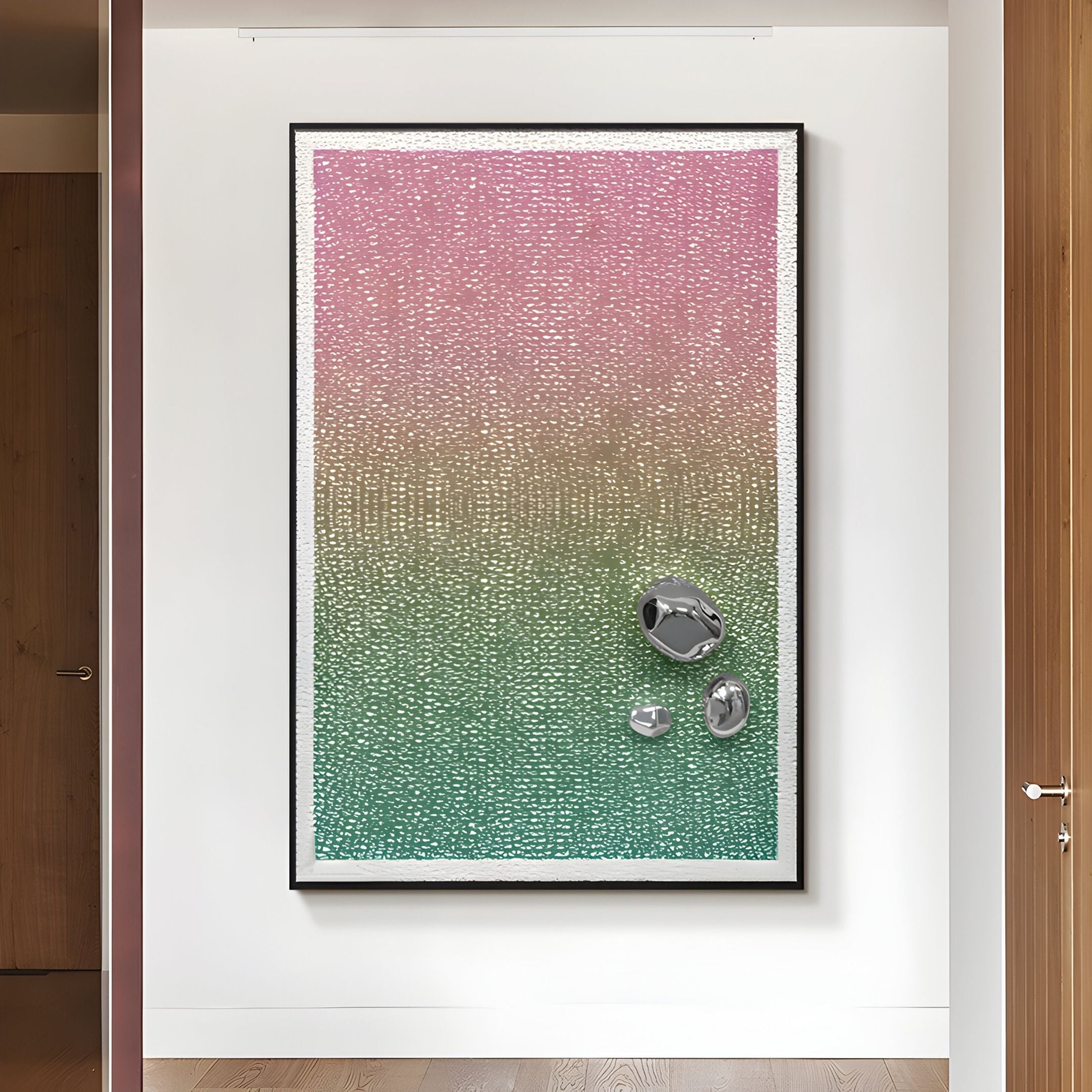The Lumevara Rose Green Fade Gradient & Chrome Droplet 3D Wall Art by Giant Sculptures features a textured pink-to-green gradient and three chrome droplets, framed and displayed on a white wall in a modern interior.