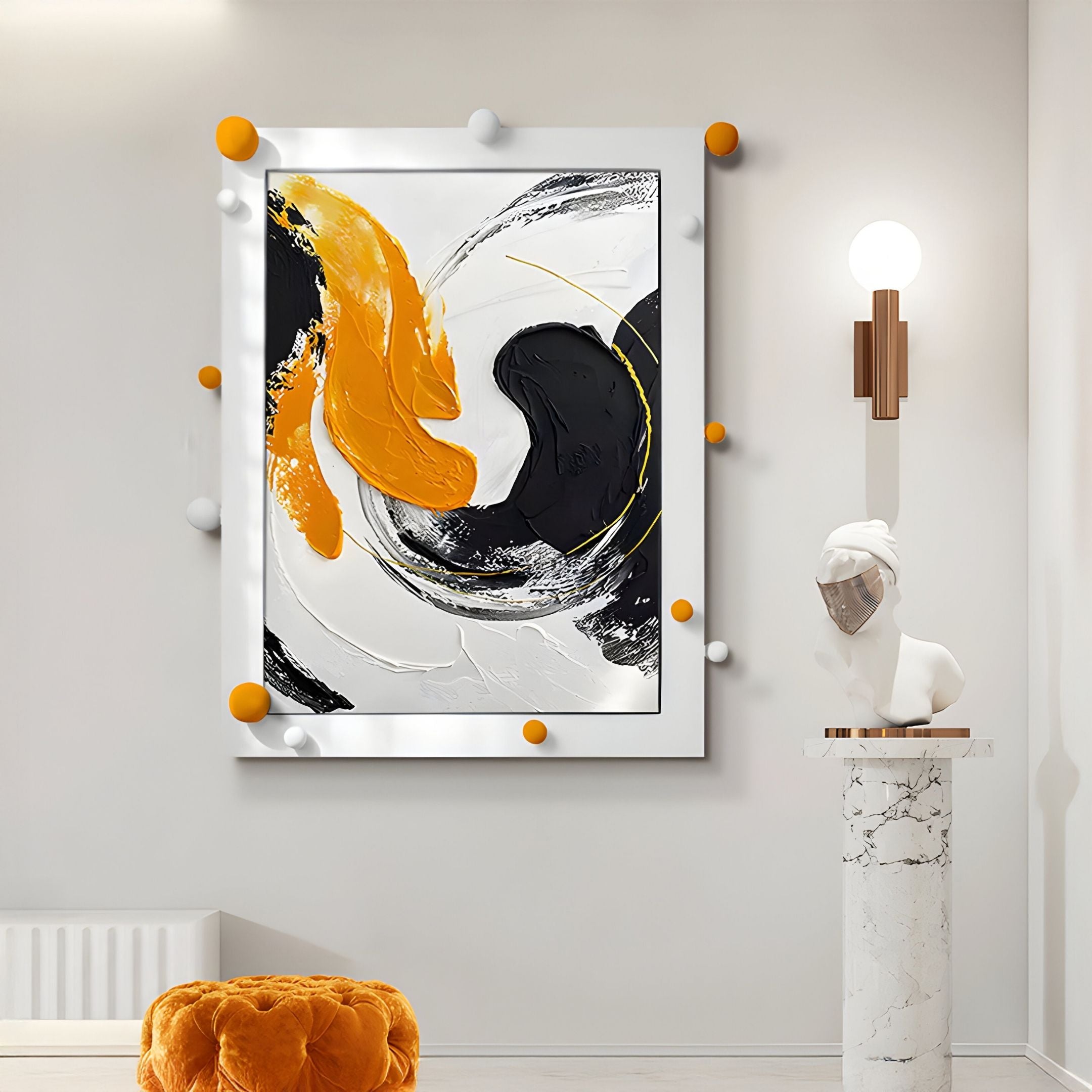 Vivexa Yellow & Black Swirl Motion Abstract 3D Wall Art by Giant Sculptures features bold swirls on a light wall, accented with orange and gray balls. A marble pedestal displays a white bust, along with a modern lamp and an orange pouf.