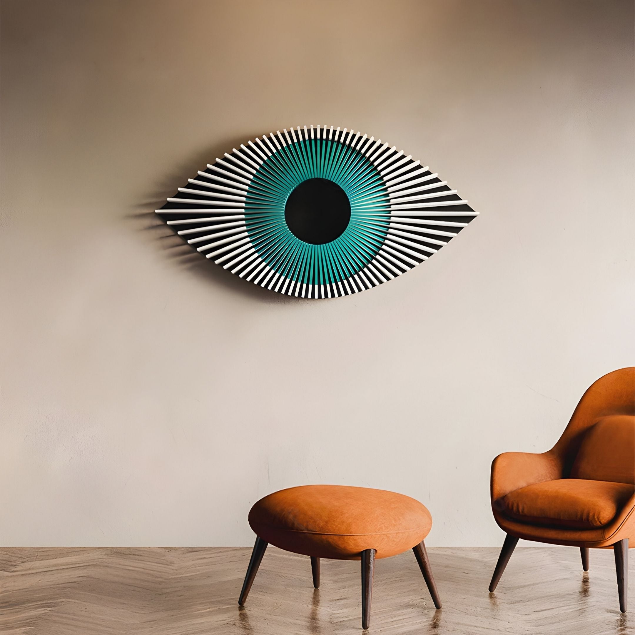 A modern living room with a tan armchair and ottoman, featuring the Aurevion Teal Radiant Eye 3D Wall Art by Giant Sculptures—the large abstract piece showcases striking blue, black, and white geometric patterns.