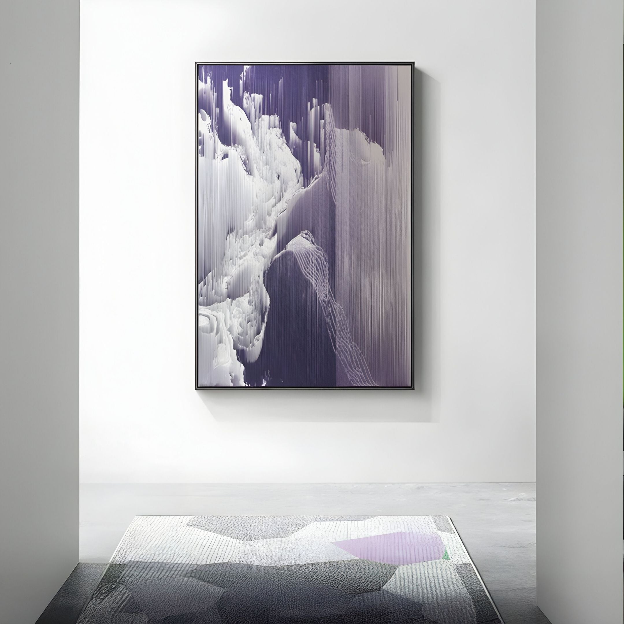 A minimalist hallway displays Giant Sculptures' Aerolune Violet & Silver Mistform Rope 3D Wall Art, a modern abstract piece in purple and white, complemented by a geometric-patterned rug on the concrete floor.