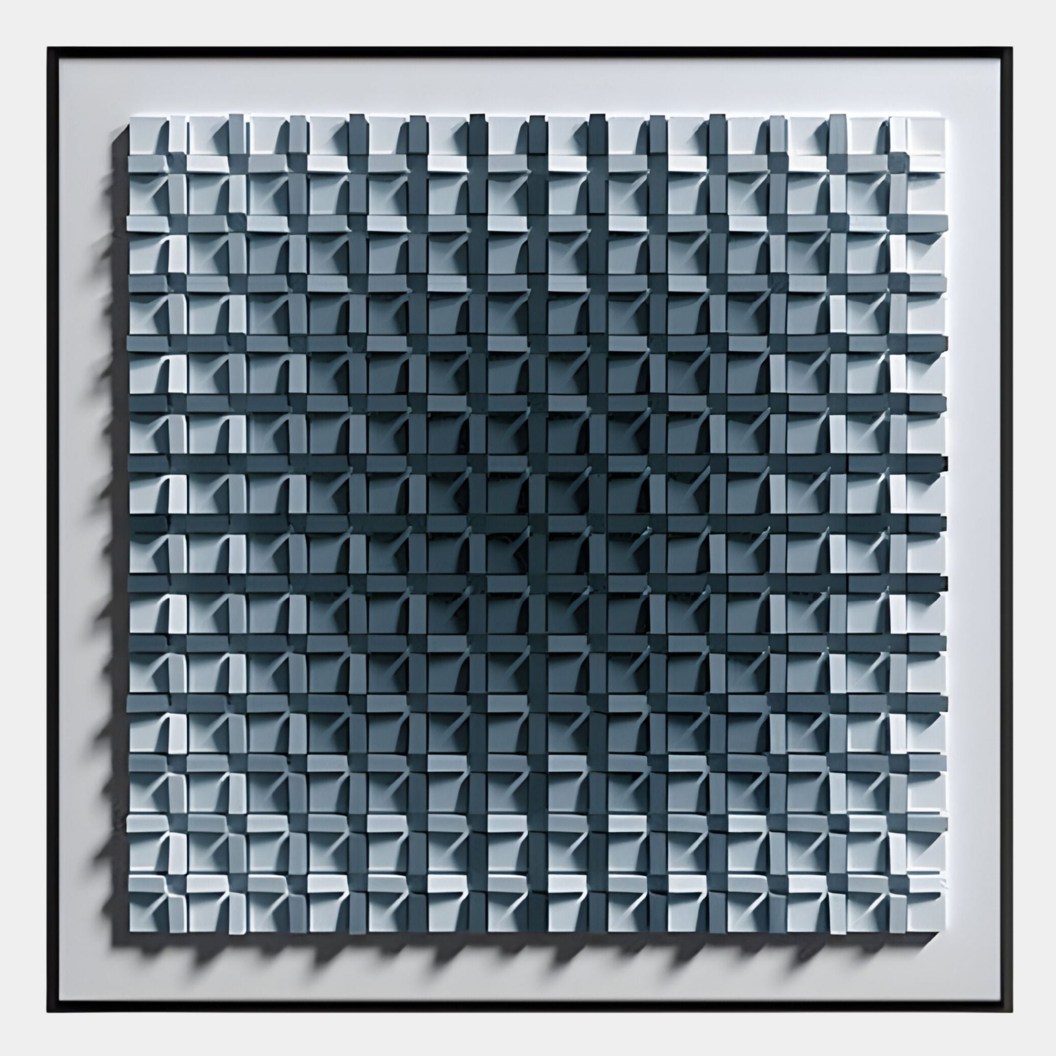 The Gradisect Steel Blue Fade Geometric 3D Wooden Wall Art by Giant Sculptures features framed raised squares in a gradient from light to dark steel blue, creating a striking three-dimensional effect.