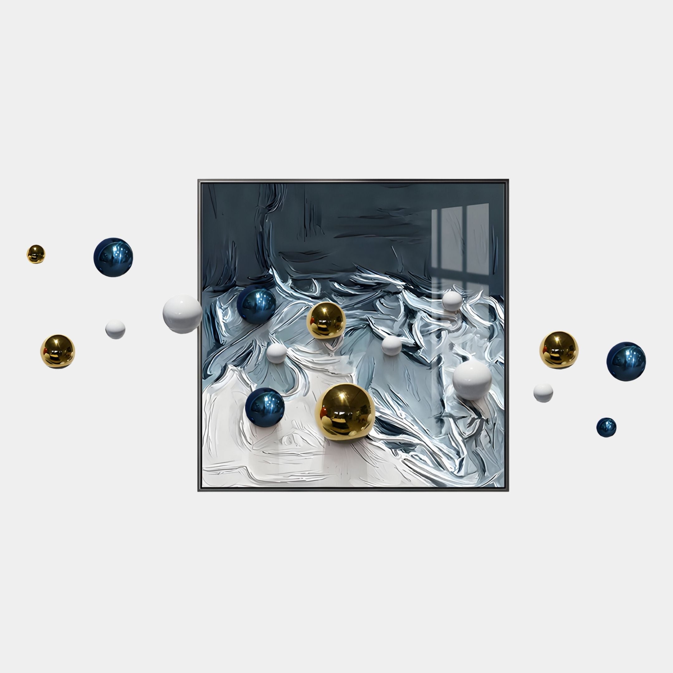 The Aeroluxe Deep Blue Wave 3D Wall Art by Giant Sculptures features a square frame with blue, white, and gray swirls, accented by metallic gold, white, and blue metal balls for striking modern wall decor.