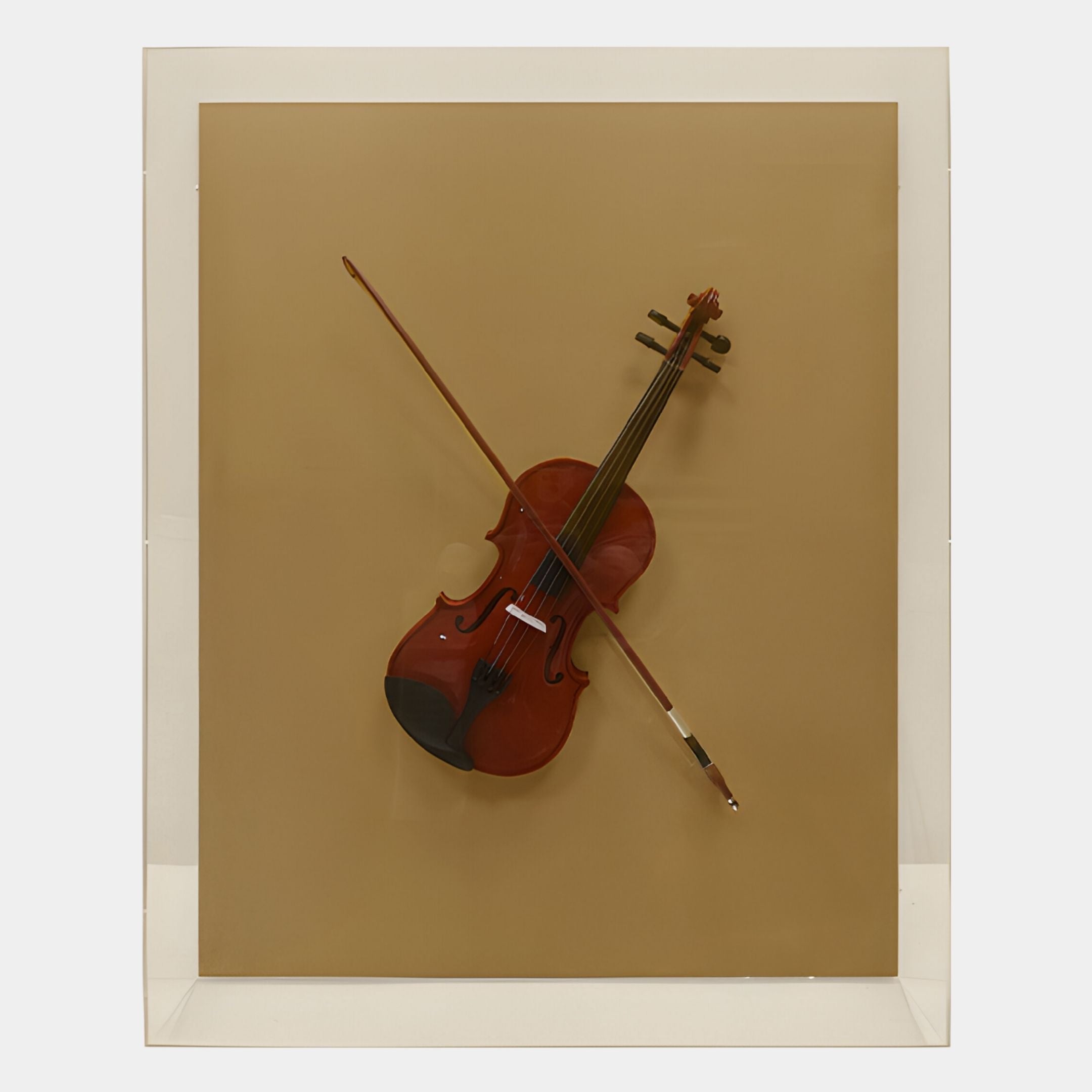 The Archetto Beige Violin Acrylic Framed 3D Wall Art by Giant Sculptures features a violin and bow mounted diagonally on a beige background in a transparent case for striking minimalist, modern decor.