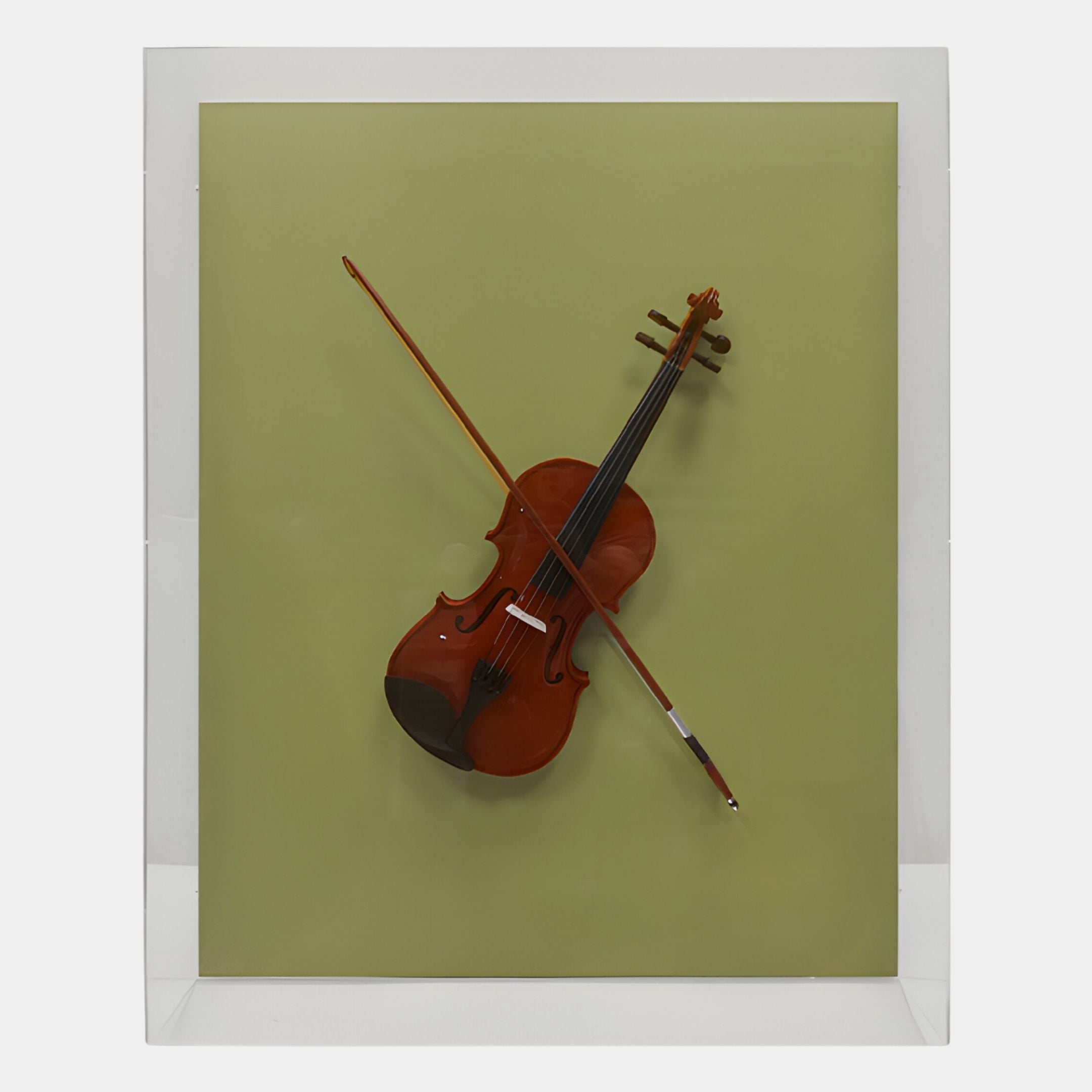 The Archetto Olive Violin Acrylic Framed 3D Wall Art by Giant Sculptures features a violin and bow mounted upright on a light green background in a clear acrylic case, creating modern minimalist wall decor.