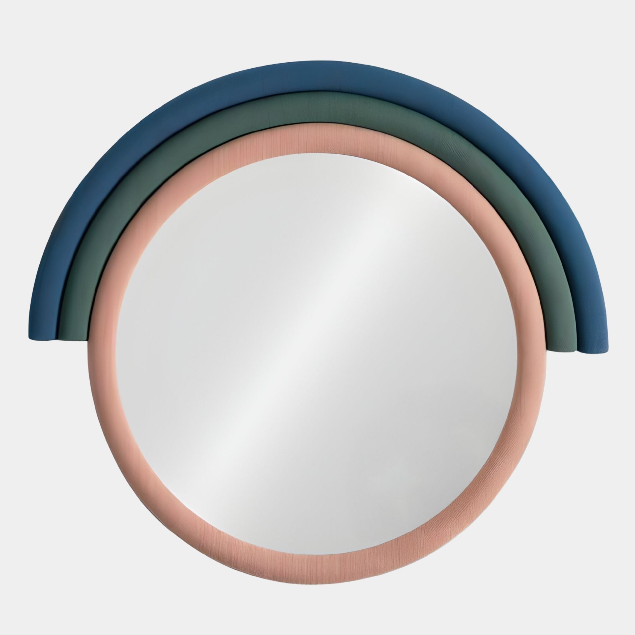 The Arcaluna Navy & Green Layered Round Mirror 3D Wall Art by Giant Sculptures features a thick pale pink frame with dark green and navy arcs, creating a minimalist rainbow look—ideal for modern spaces.