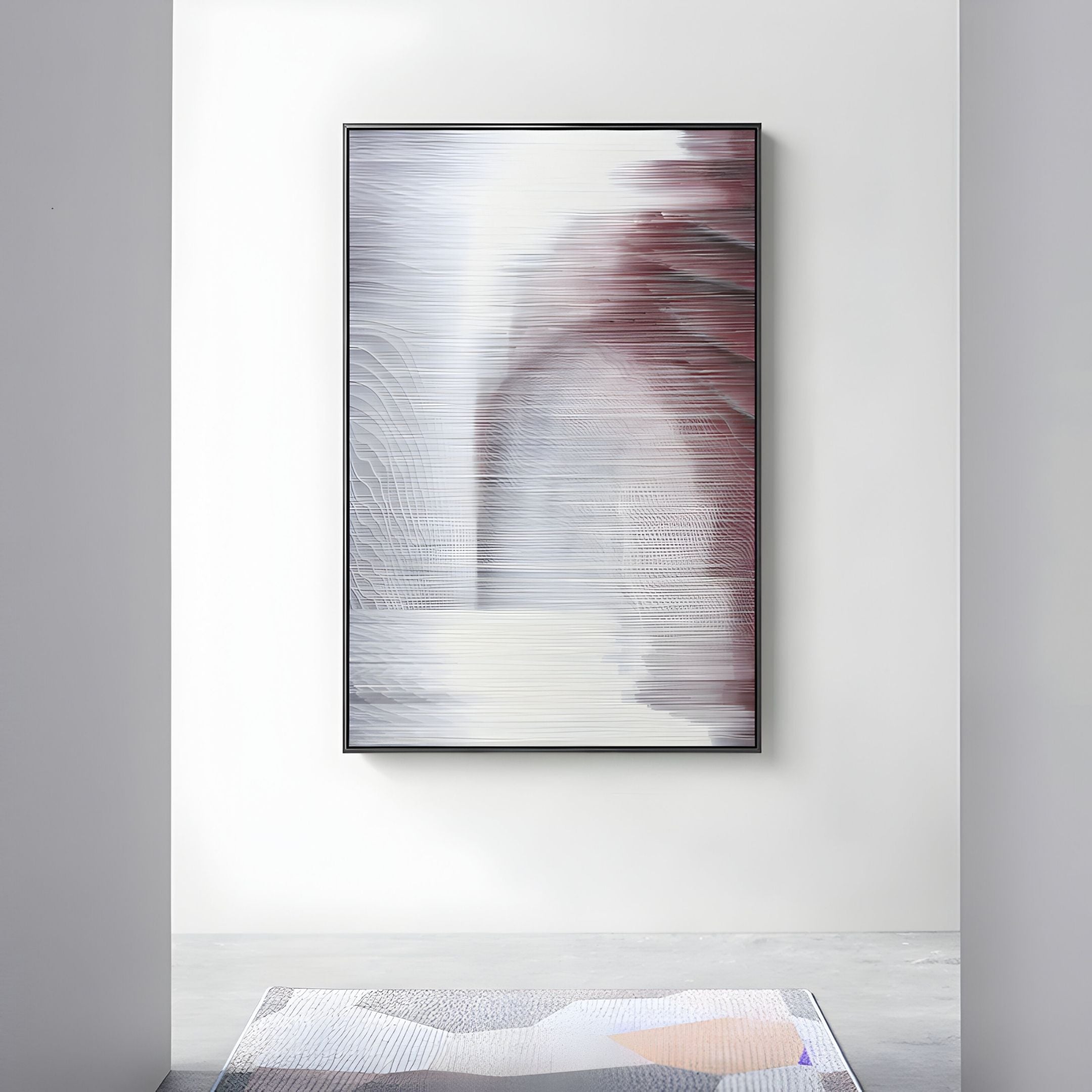 The Striathen Crimson & Grey Blur Textured Rope 3D Wall Art by Giant Sculptures, featuring blurred vertical lines in white, gray, and maroon, hangs above a light-colored rug in a minimalist room.