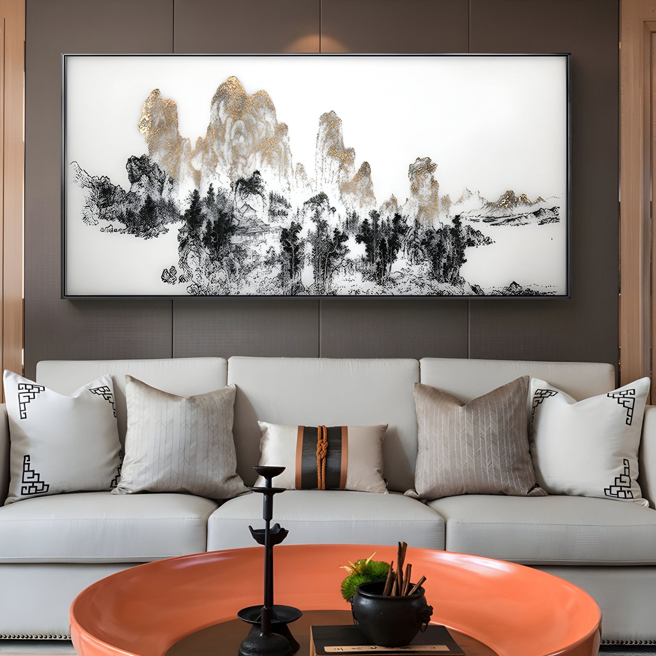 A modern living room with a beige sofa, neutral pillows, an orange coffee table, and the Giant Sculptures Aureink Mountain Panorama Textured Silk 3D Wall Art as a striking centerpiece above the sofa.