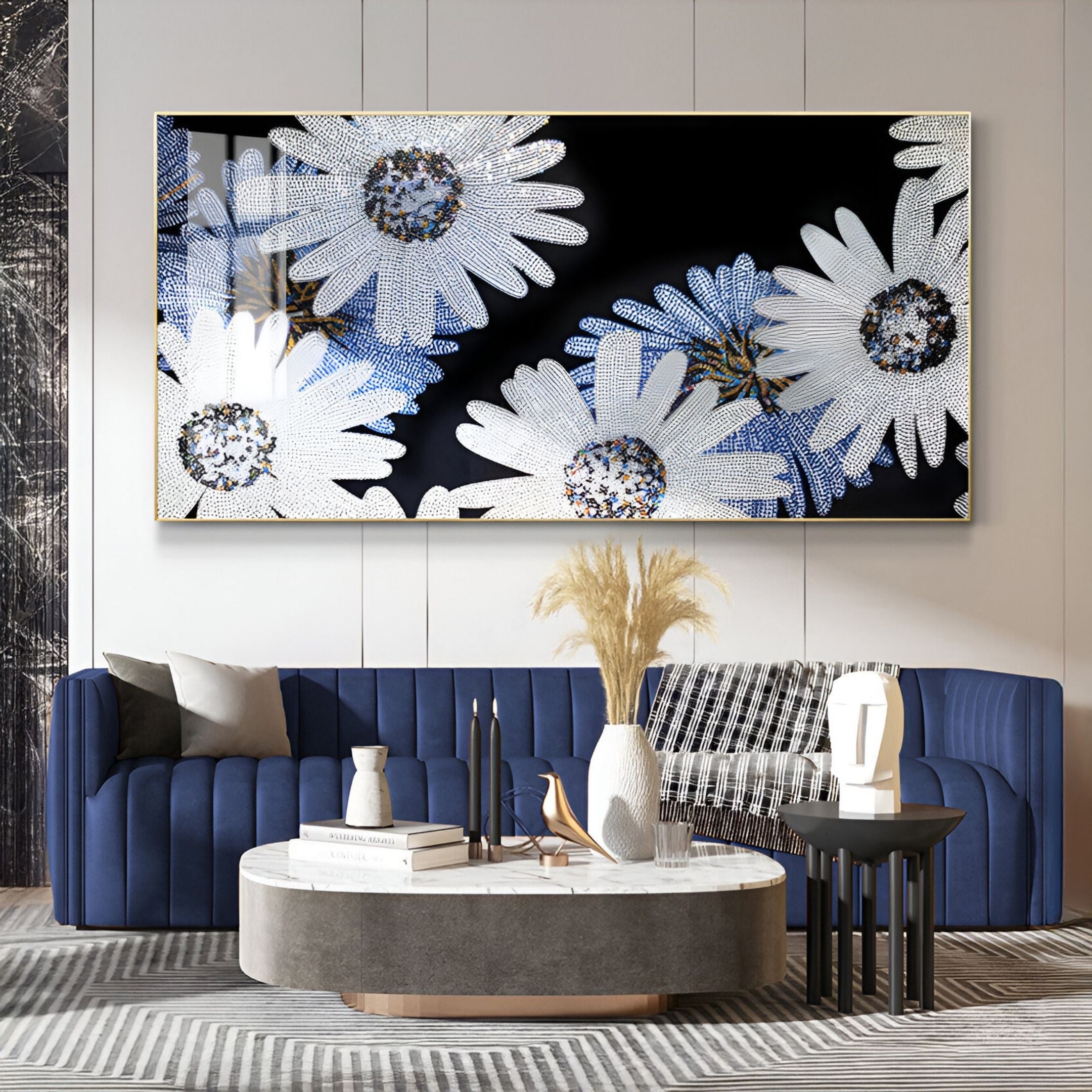 A modern living room features a dark blue velvet sofa, black-and-white throw, round concrete coffee table with décor, and the Floravida White & Blue Crystal Daisy Floral 3D Wall Art by Giant Sculptures as striking decor above the seating area.
