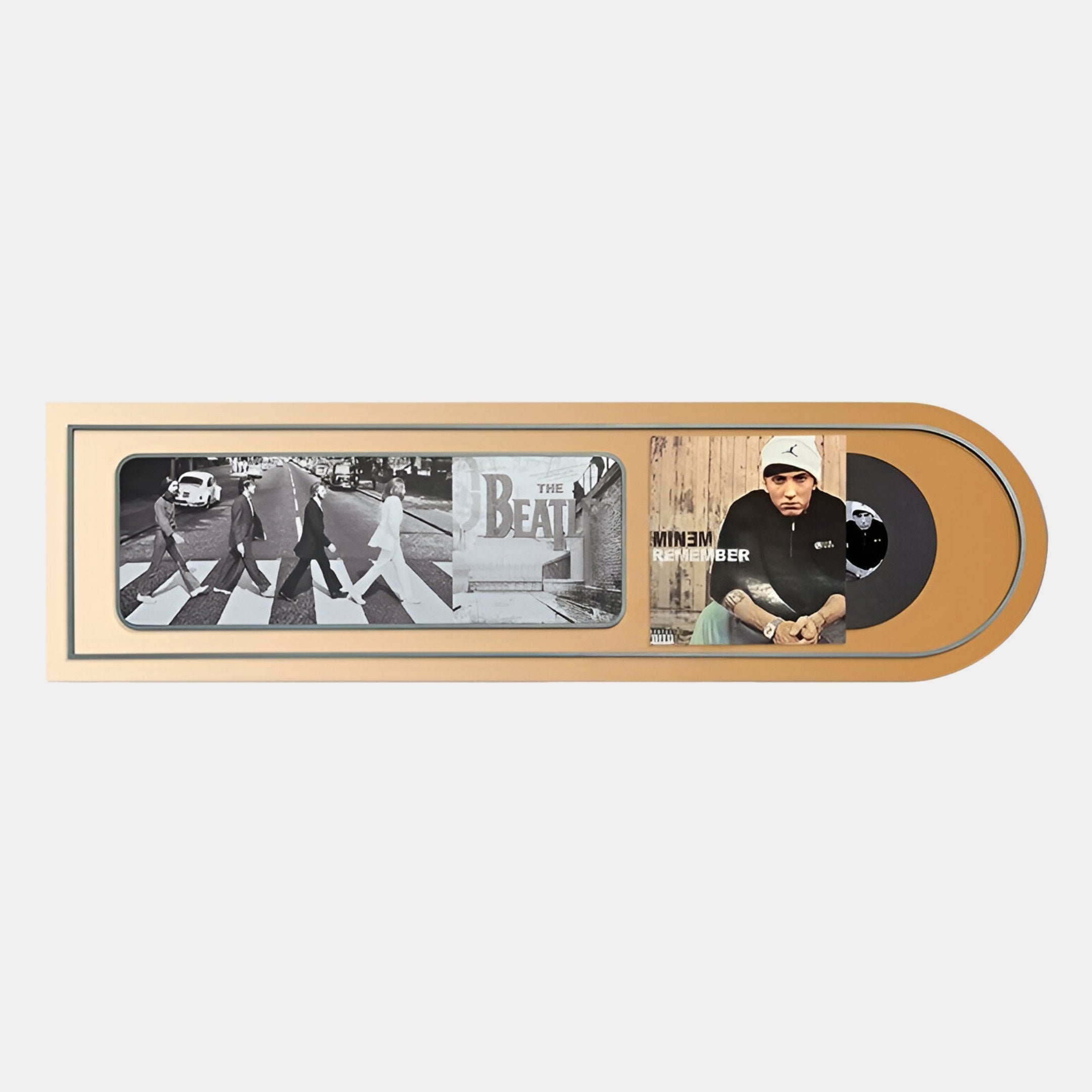 The Sonarta Gold Beatles & Eminem Record Panel Wall Art by Giant Sculptures features Abbey Road and The Eminem Show album covers with a gold record, making bold music decor for any room.