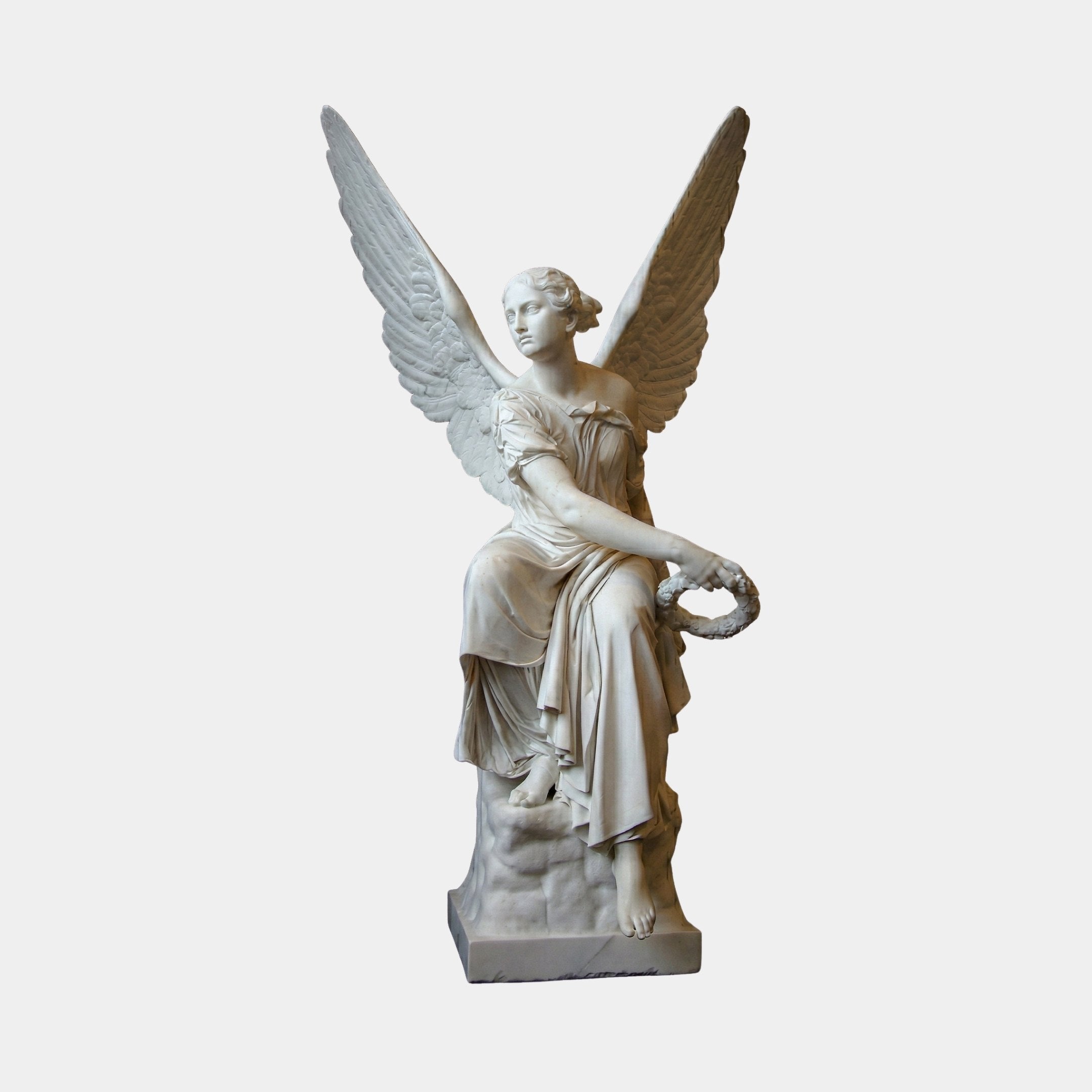 Angel Holding Wreath marble outdoor sculpture by Giant Sculptures, 150cm tall winged figure in white marble draped in flowing robes, extending a laurel wreath, on a rectangular base against a plain light background.