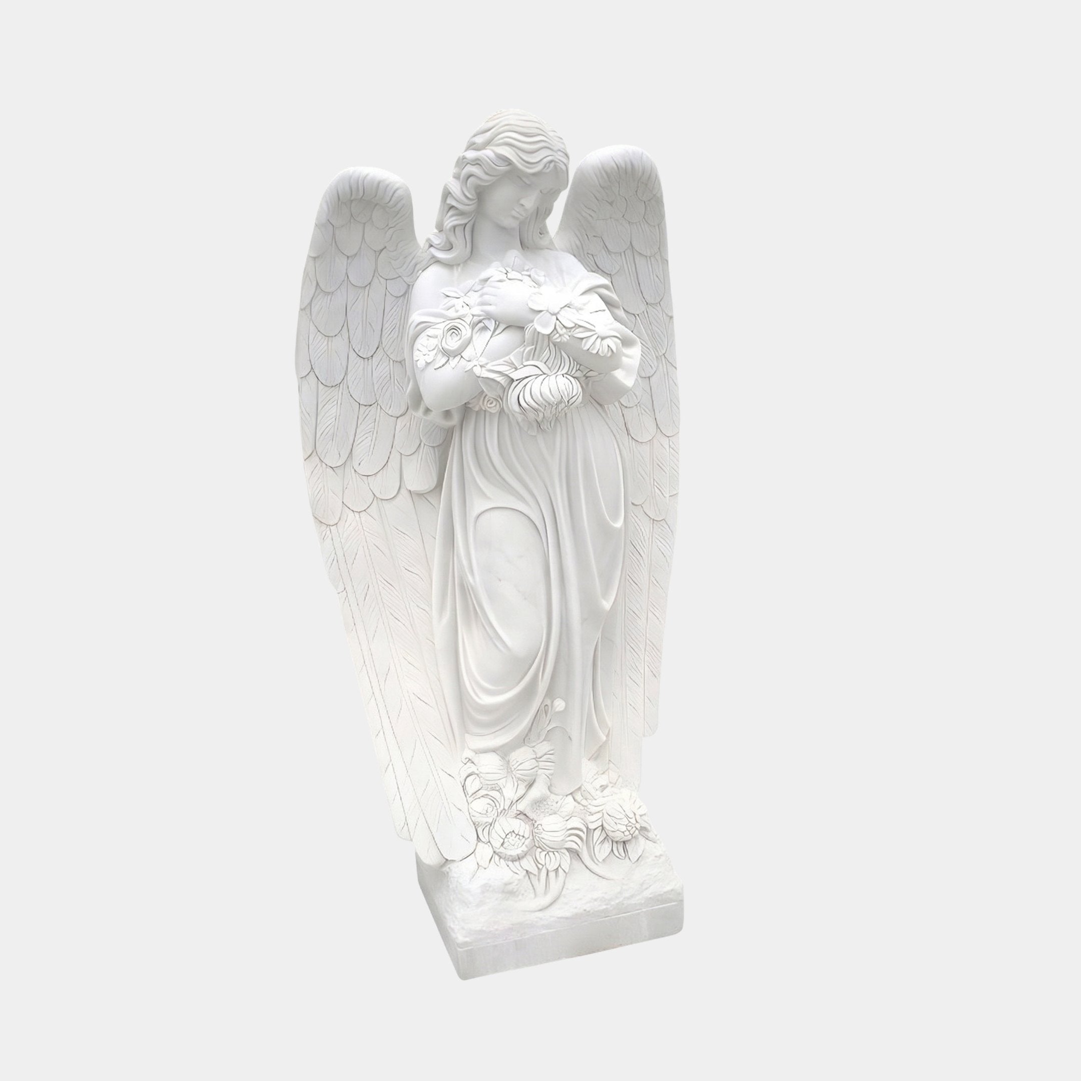 Standing Angel Marble Outdoor Sculpture – 150cm by Giant Sculptures, a white natural marble angel holding flowers with detailed feathered wings and draped robes on a rectangular base, plain grey background.