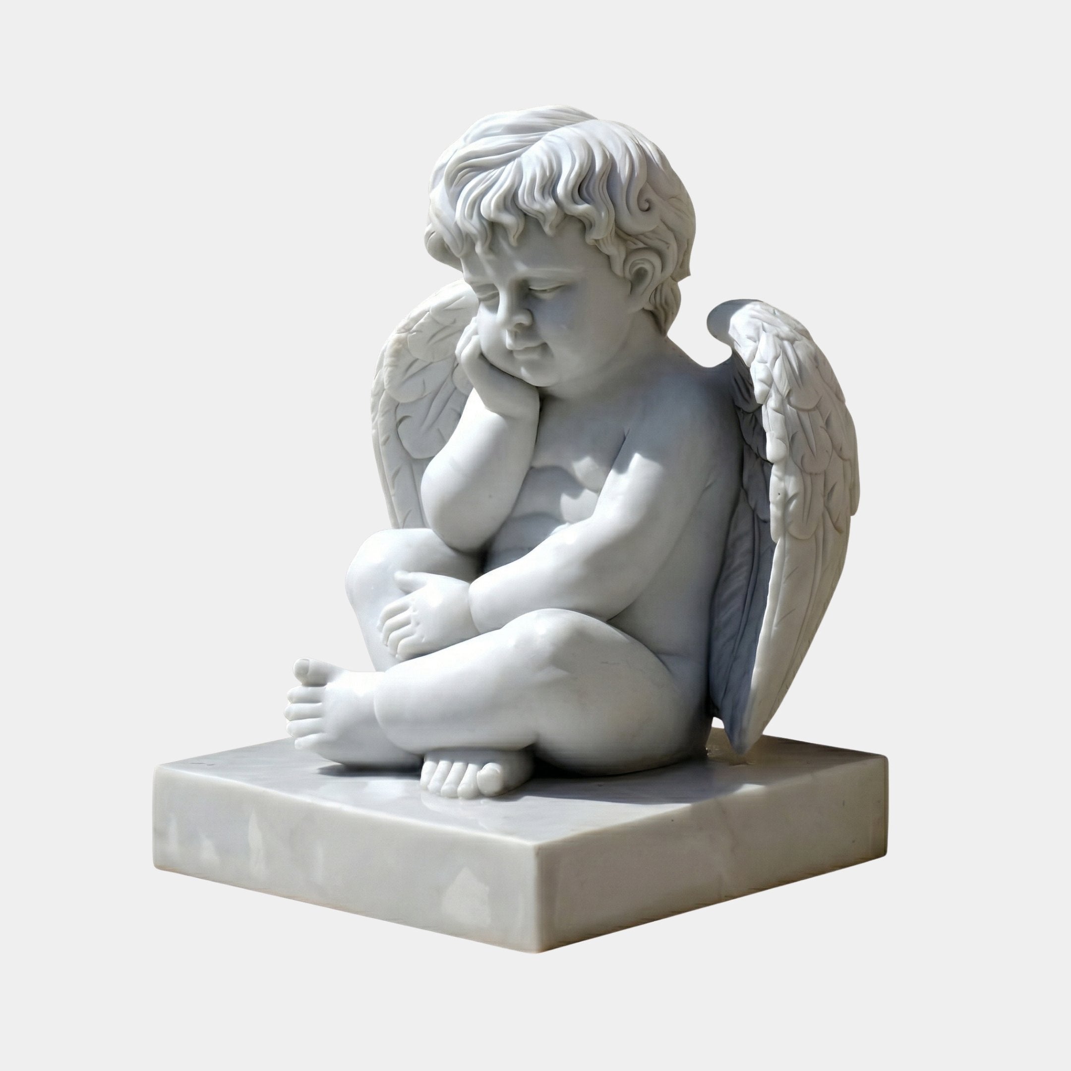 The Sleeping Baby Angel Marble Outdoor Sculpture by Giant Sculptures features a cherubic figure with wings, seated on a square base with its head resting on one hand, evoking a thoughtful expression. Height: 50cm.
