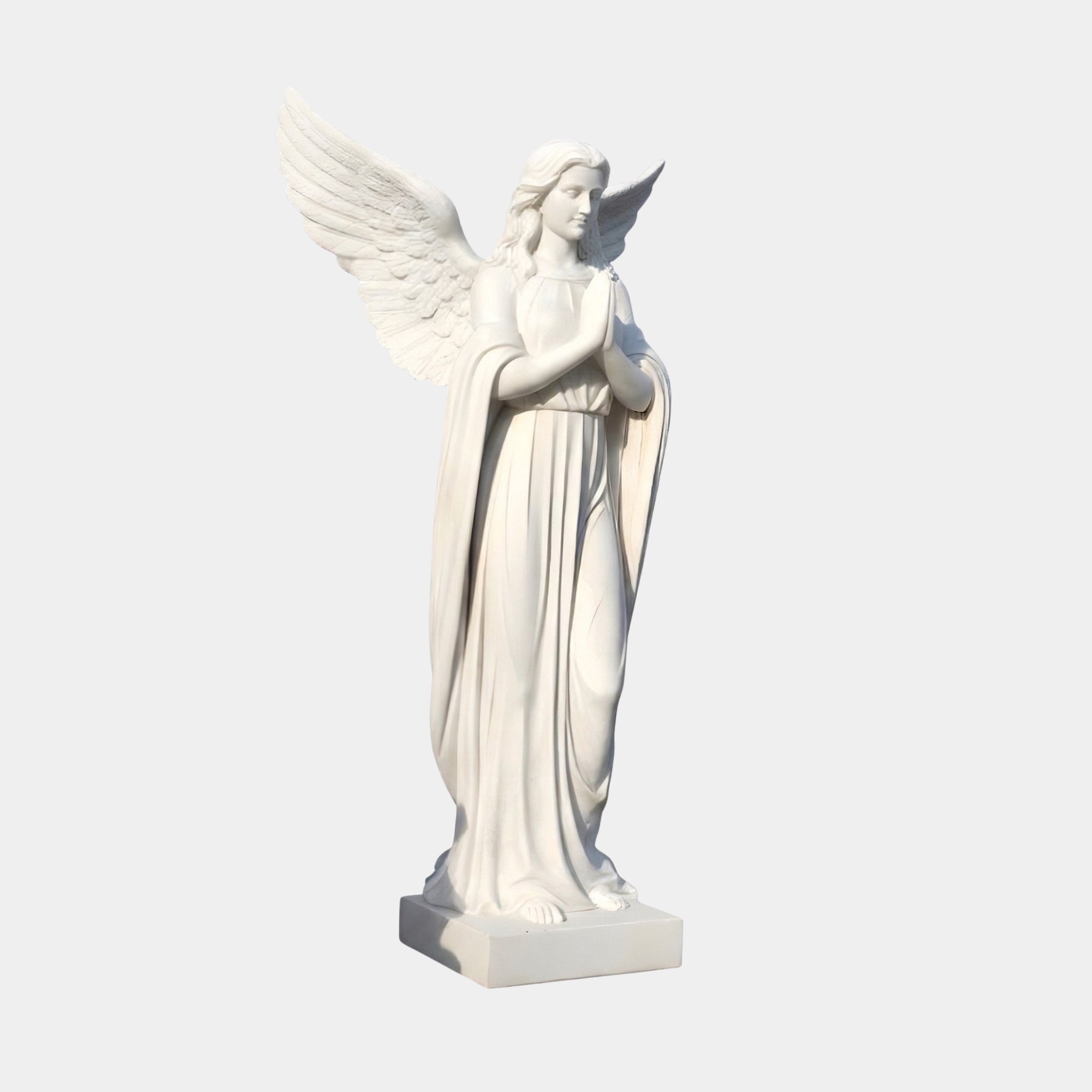 Praying Lady Marble Angel Sculpture in white natural marble, depicting a serene winged angel in flowing robes with hands clasped in prayer, on a square base, against a plain light background.