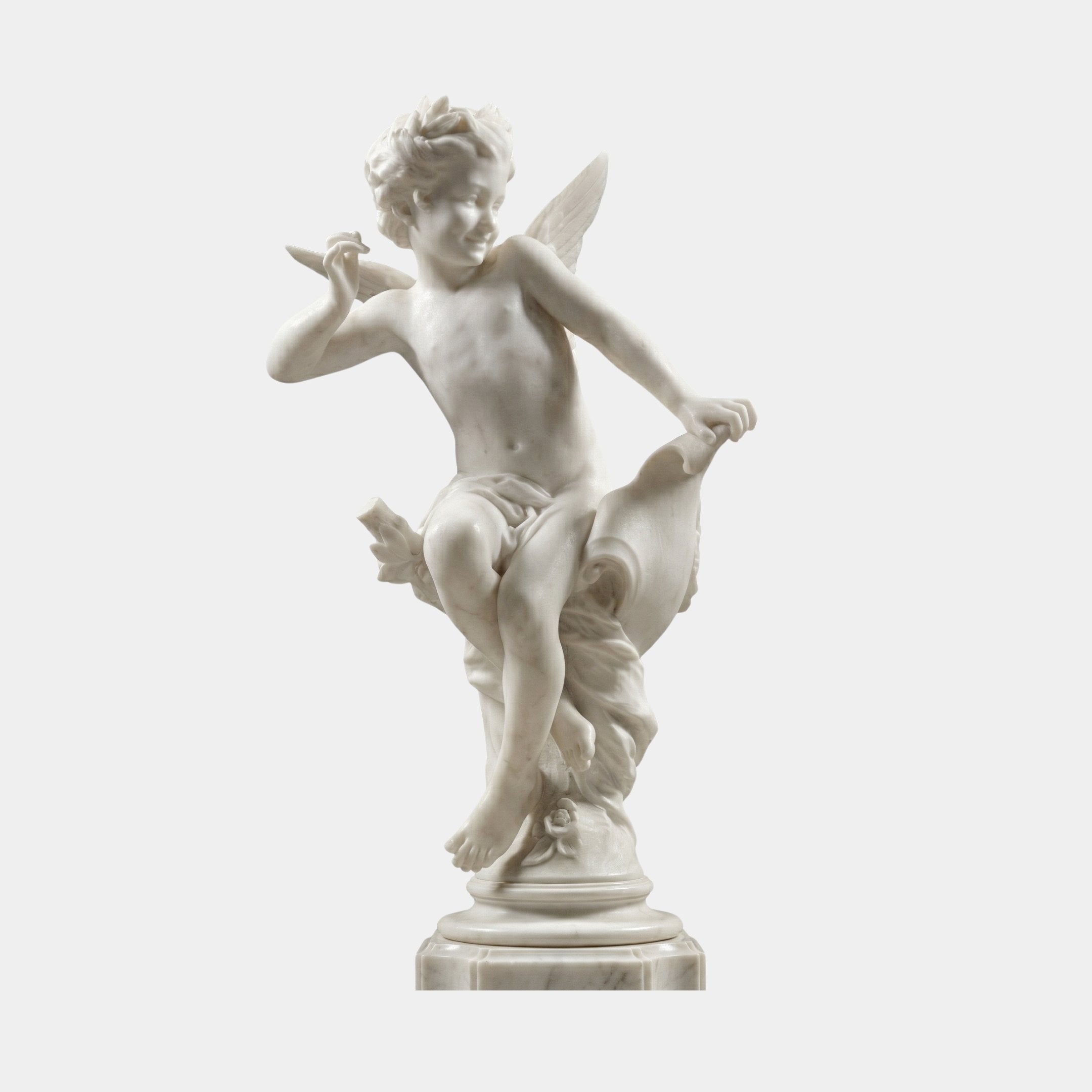 Winged Sitting Cherub Angel Marble Outdoor Sculpture in white marble, depicting a smiling cherub seated with spread wings and a bird in hand, on a round pedestal base, against a plain light background.