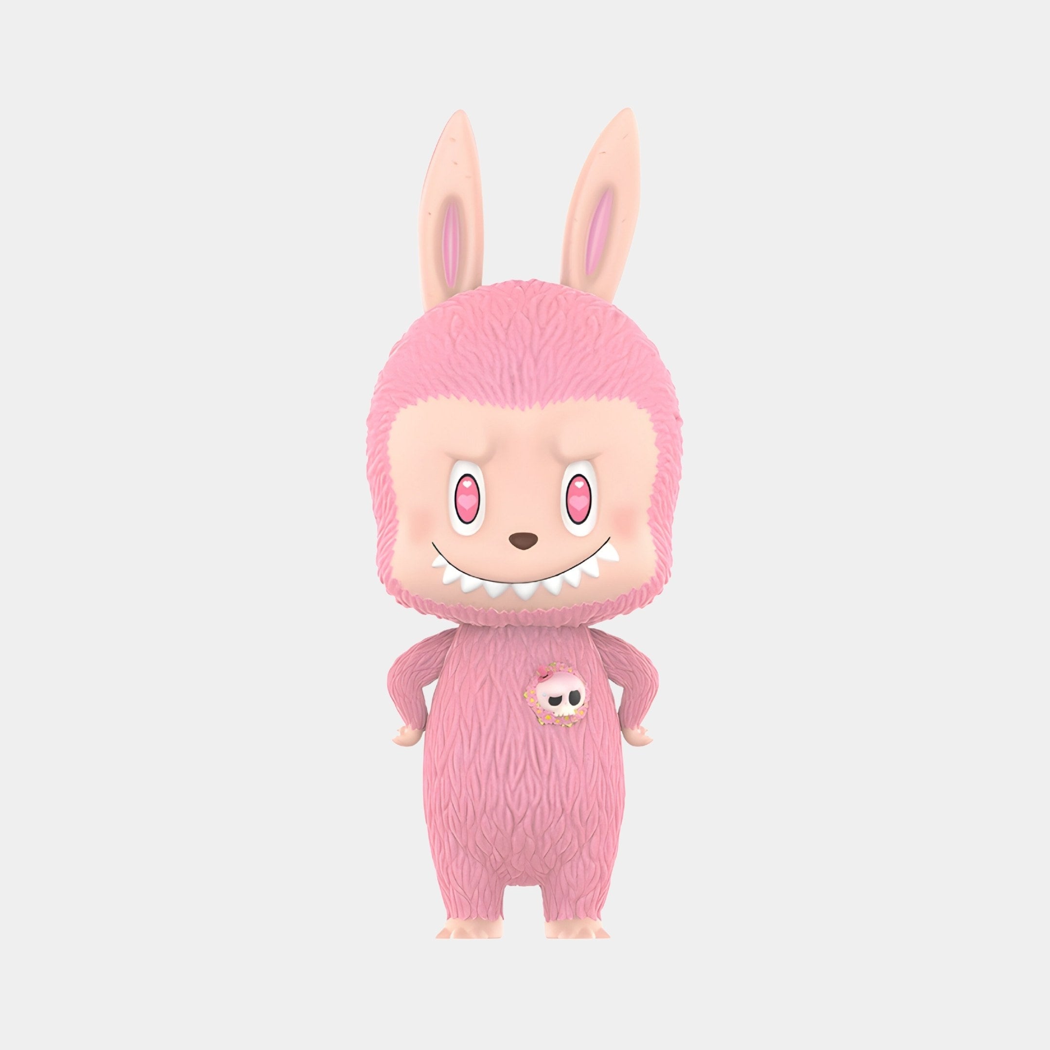 The Monster Mega Pink Labubu Sculpture by Giant Sculptures stands 73cm tall, featuring Labubu in a fuzzy pink bunny suit with tall ears, sharp teeth, pink eyes, and a tiny skull on the chest, posing hands on hips and facing forward.