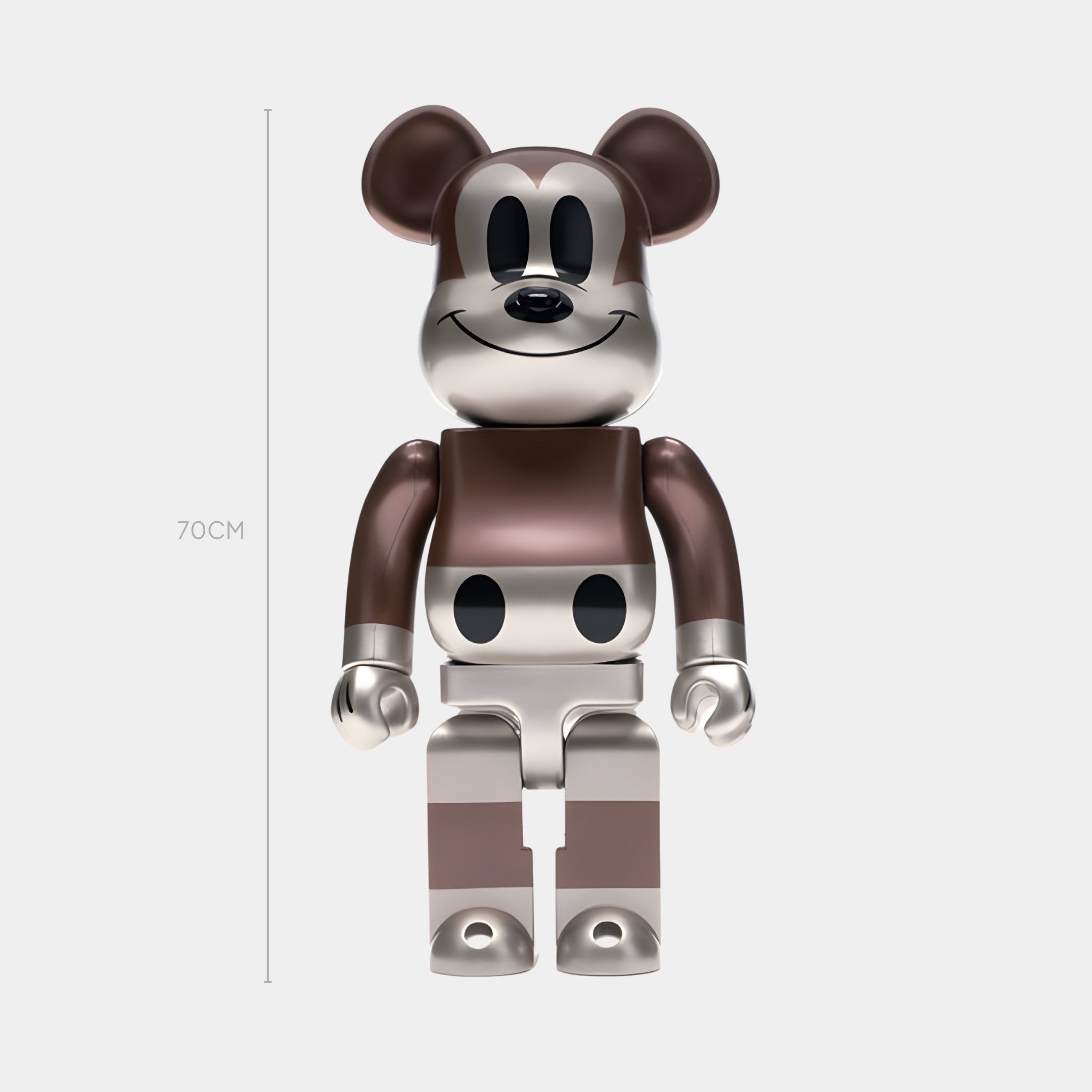 The Metallic Sepia Toon Bear Sculpture - 70cm by Giant Sculptures features a cartoon-style face, rounded ears, large eyes, and a smiling vintage look on a brown and silver robot-inspired body with stylized designs.