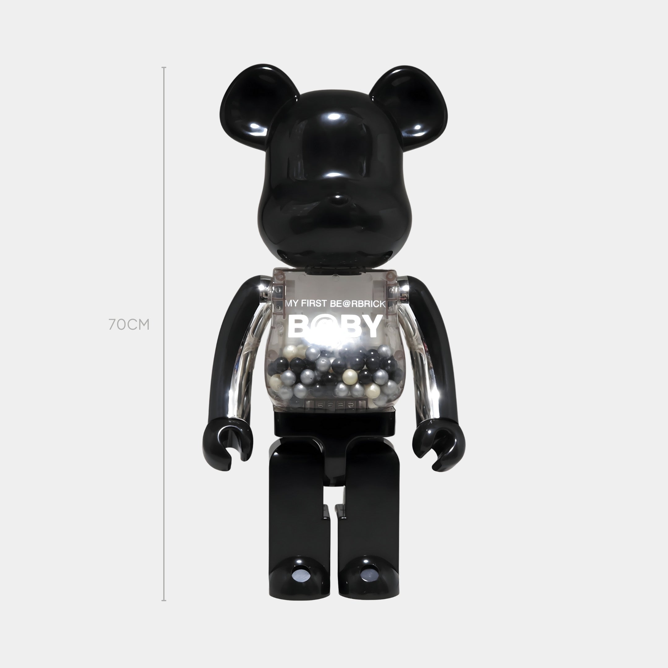 The 70cm Midnight Chrome Beads Bear Sculpture by Giant Sculptures features a black bear shape with transparent arms and chest filled with chrome beads, plus MY FIRST BE@RBRICK BABY on its chest—ideal for modern interiors.