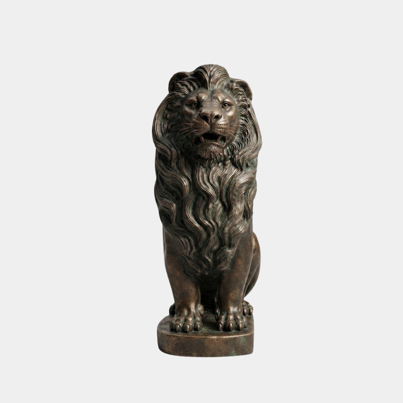 Patinated bronze lion seated square on a round cast disc
