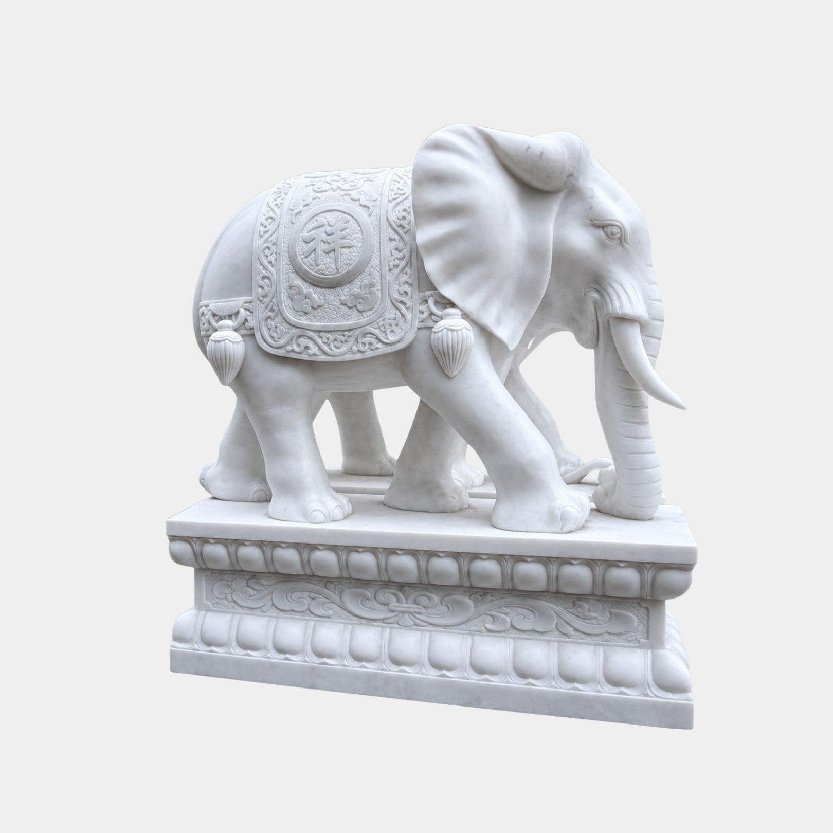 White marble elephant with a cloud-scroll bordered saddle-cloth
