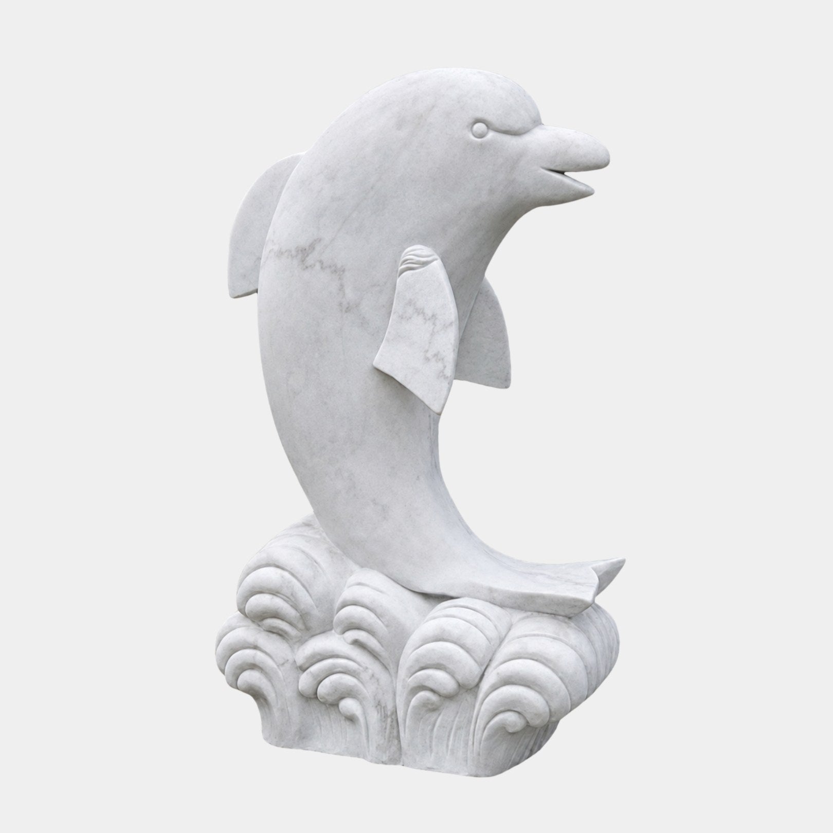 White marble dolphin leaping from a bank of tightly scrolled carved waves