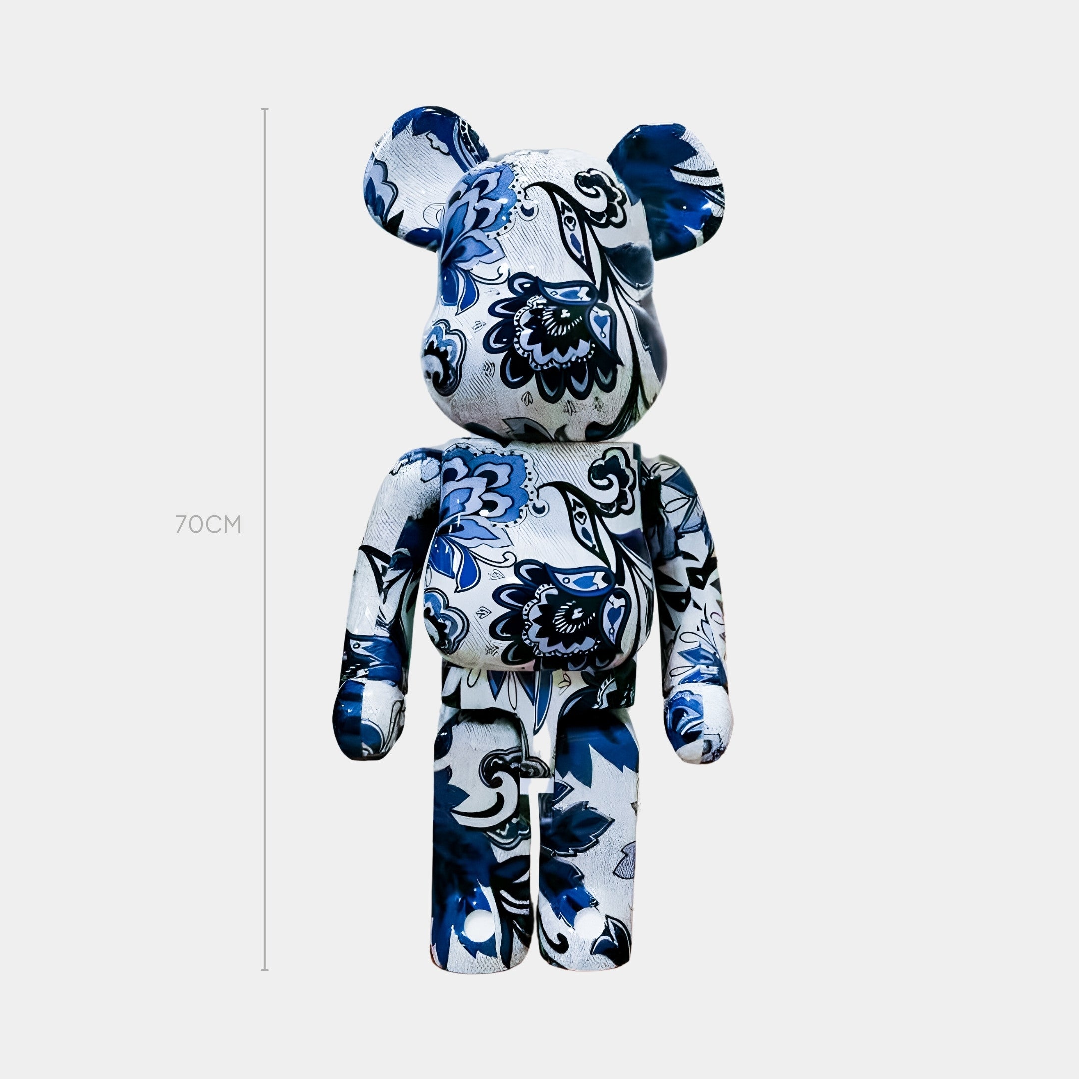 The Giant Sculptures Porcelain Art Bear Sculpture - 70cm stands upright against a plain light background, its body adorned with blue, black, and white cobalt-blue floral motifs—a striking piece of contemporary art.