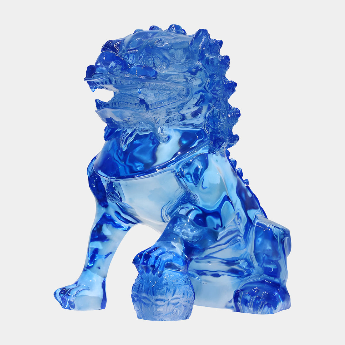 Blue Guardian Lion with Ball on the Left Cast Resin Sculpture, 38cm, cobalt blue resin with tight curled mane and banded collar, paw on ball, shown on a plain white background.