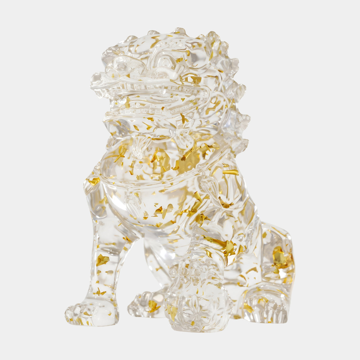Clear Gold-Leaf Guardian Lion with Ball resin sculpture, 38cm, seated upright with gold flakes suspended throughout, shown against a plain white background.