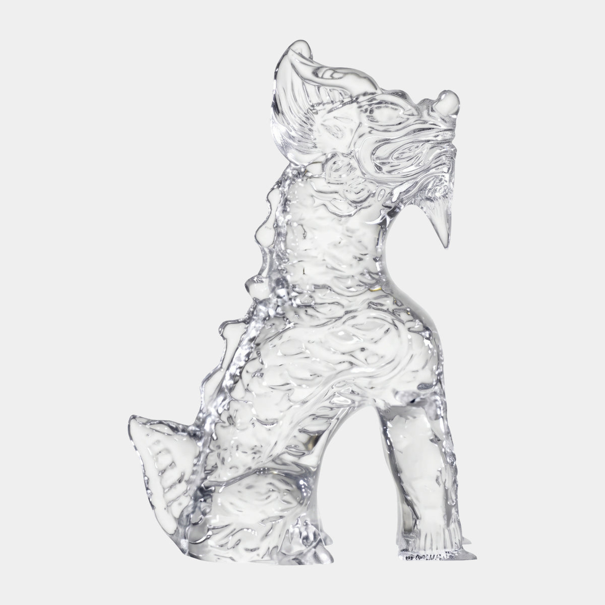 Clear Fanged Beast Cast Resin Sculpture, 27cm, seated dragon-like figure with open fanged mouth and ridged spine, clear resin finish on a plain white background.
