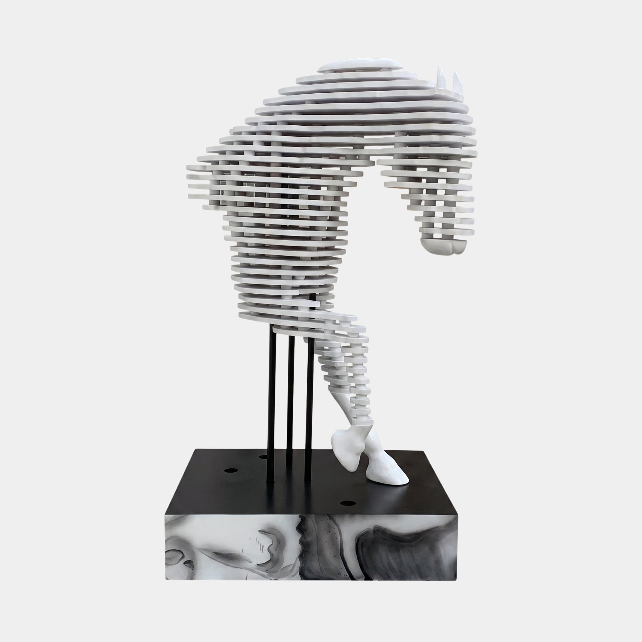 Side view of the 160cm Rising Stallion White Wood Horse Sculpture by Giant Sculptures, layered white wood slabs on slim black uprights, shown on the optional marble-sided plinth.