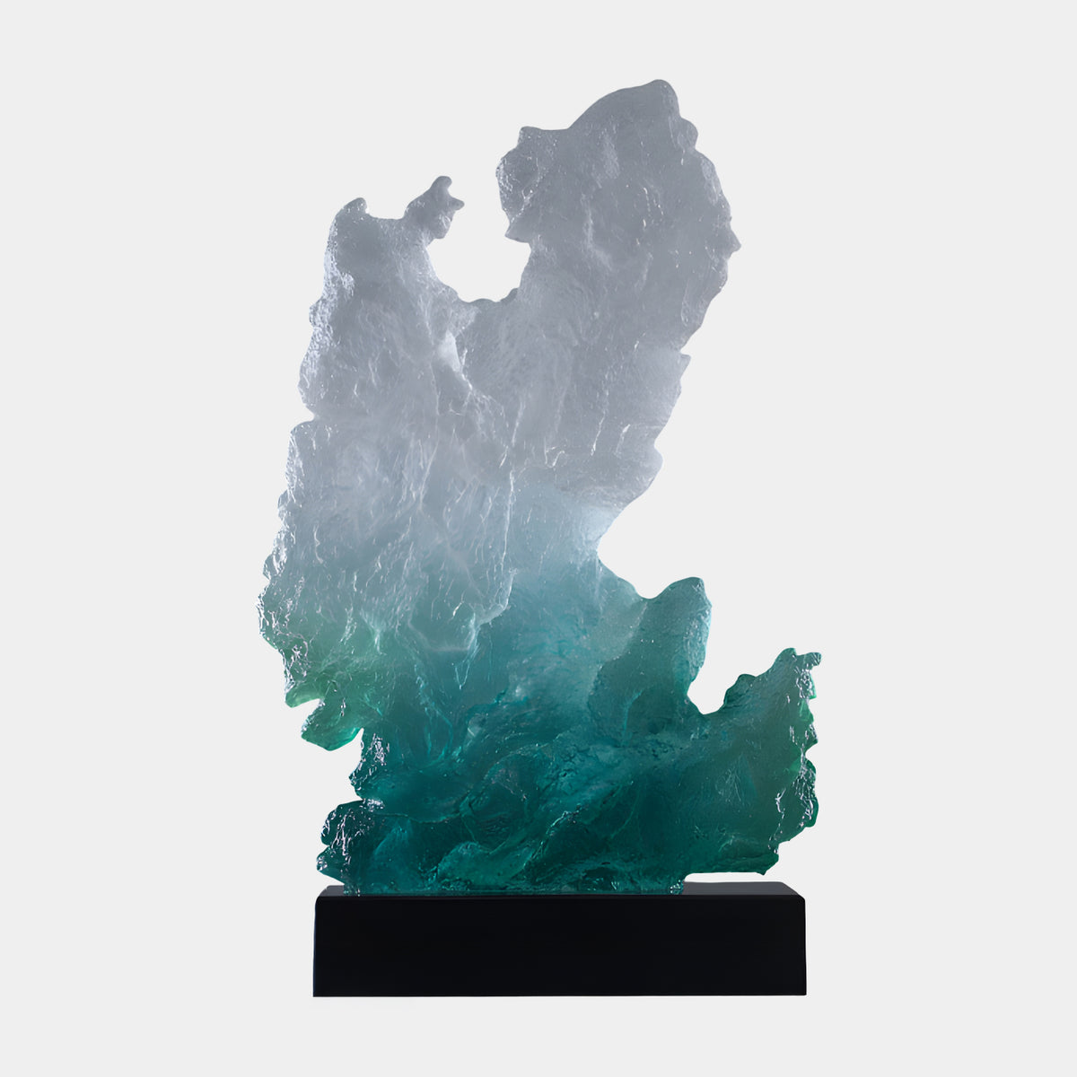 Teal Frosted Standing Rock on Marble Resin Sculpture, 88cm, with frosted white top fading to teal at a jagged base, on a black marble block, plain light background.