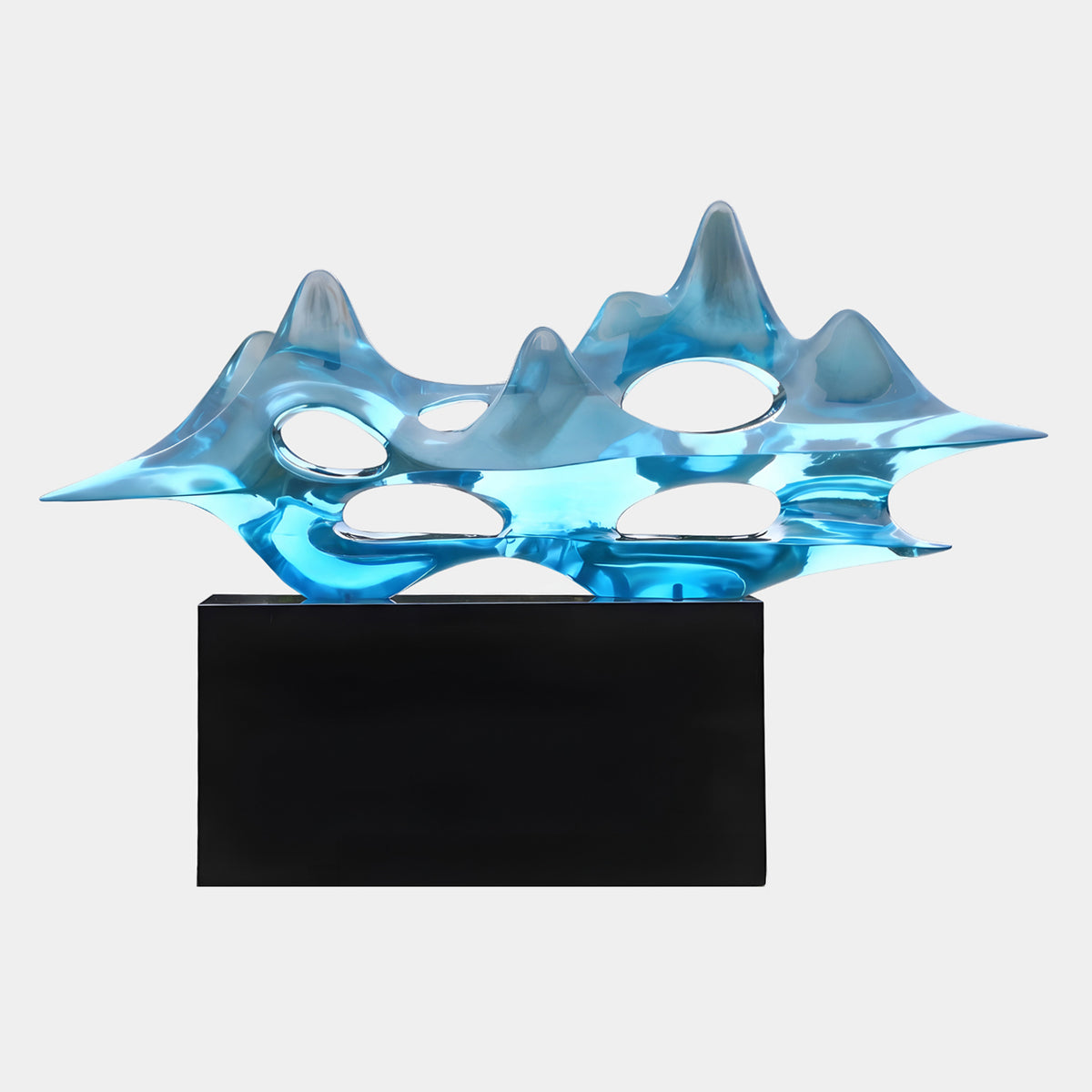 Blue Pierced Mountain Range Resin Sculpture (250cm) by Giant Sculptures, translucent blue peaks with oval openings on a black marble plinth, plain white background.