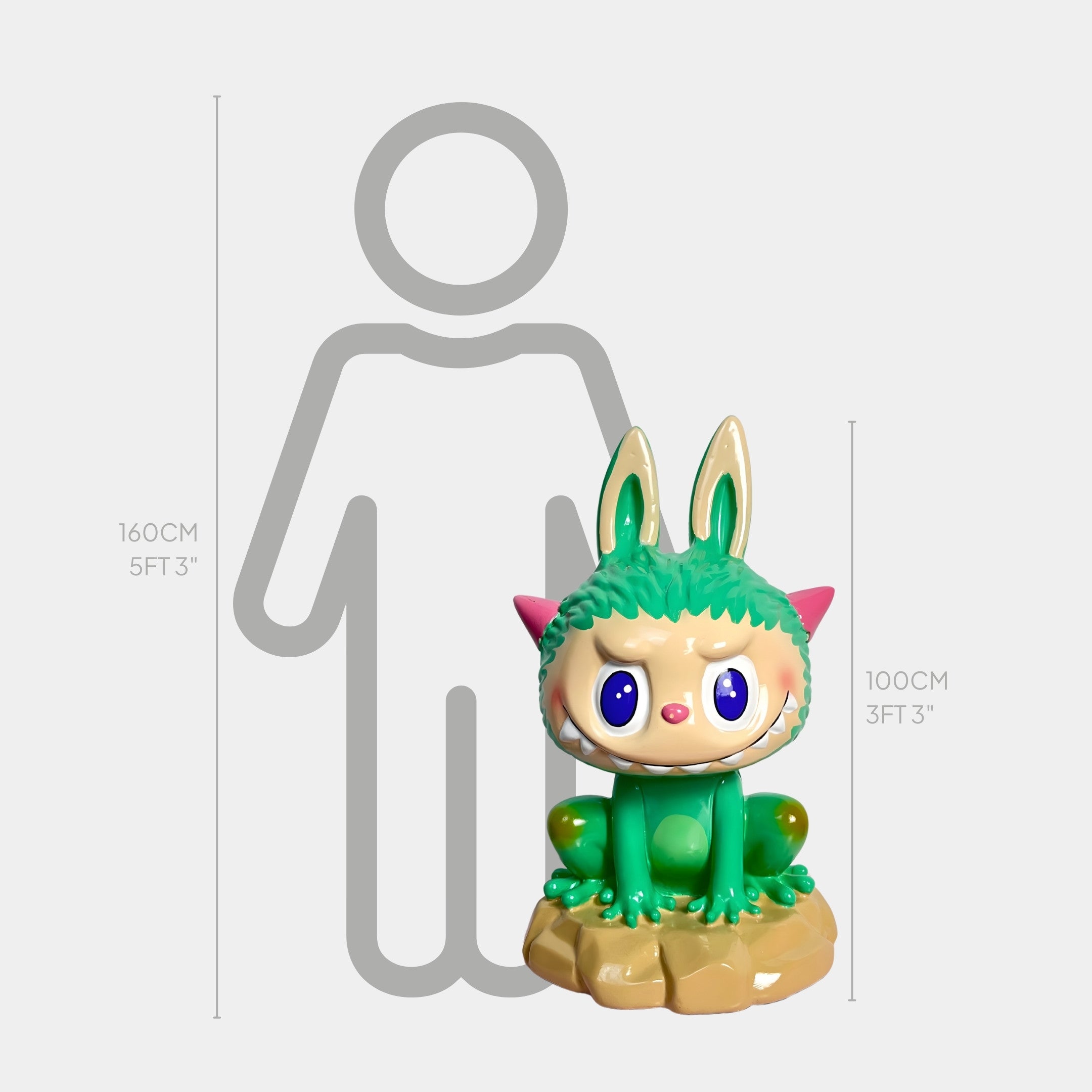 The Monster Frog Labubu Sculpture by Giant Sculptures stands about 100 cm tall, featuring a green and beige design with large eyes and pink ears—ideal for high-end interiors as shown beside a 160 cm human outline for scale.