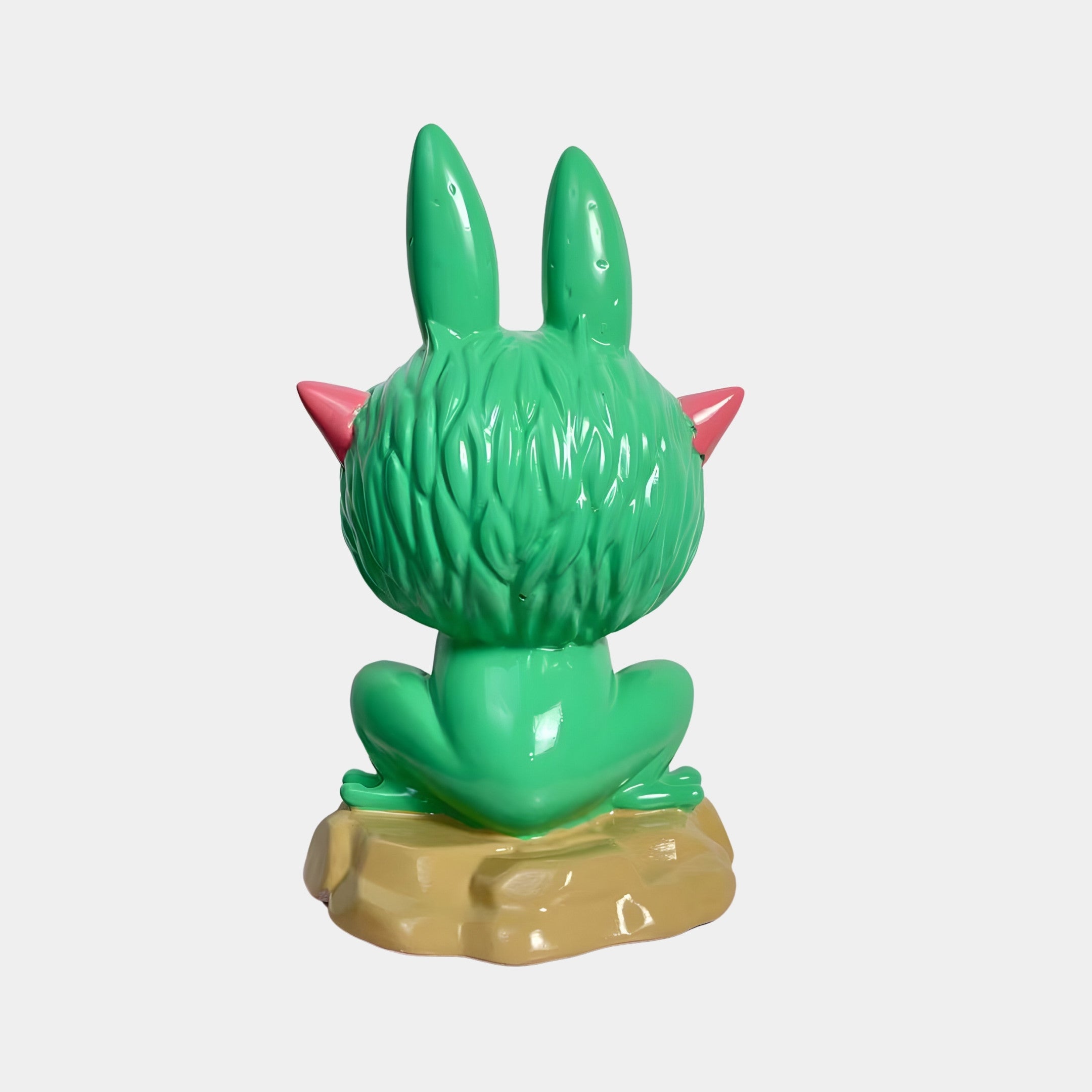 The Monster Frog Labubu Sculpture - 160cm by Giant Sculptures features a glossy green finish, tall ears, and pink horns. It squats on a tan base with its textured back showing, showcased against a plain white background.