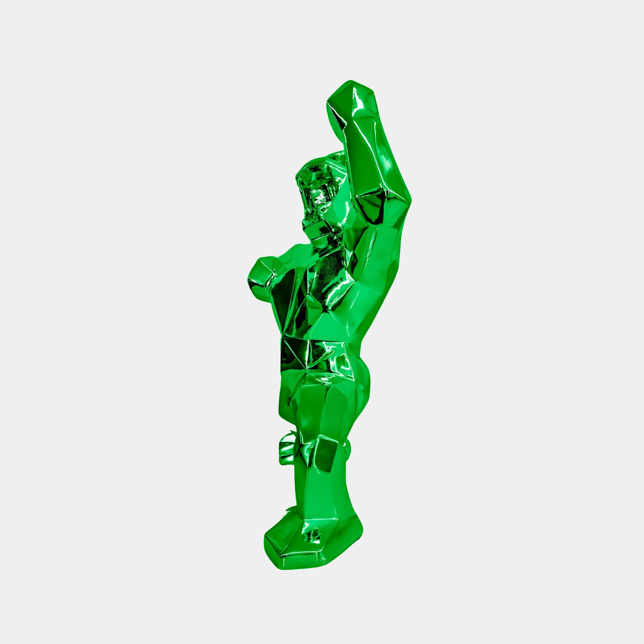 The Giant Sculptures Forrest Green Gorilla Sculpture - 50cm stands upright, showcasing its glossy electroplated finish and sleek geometric lines against a plain white background.