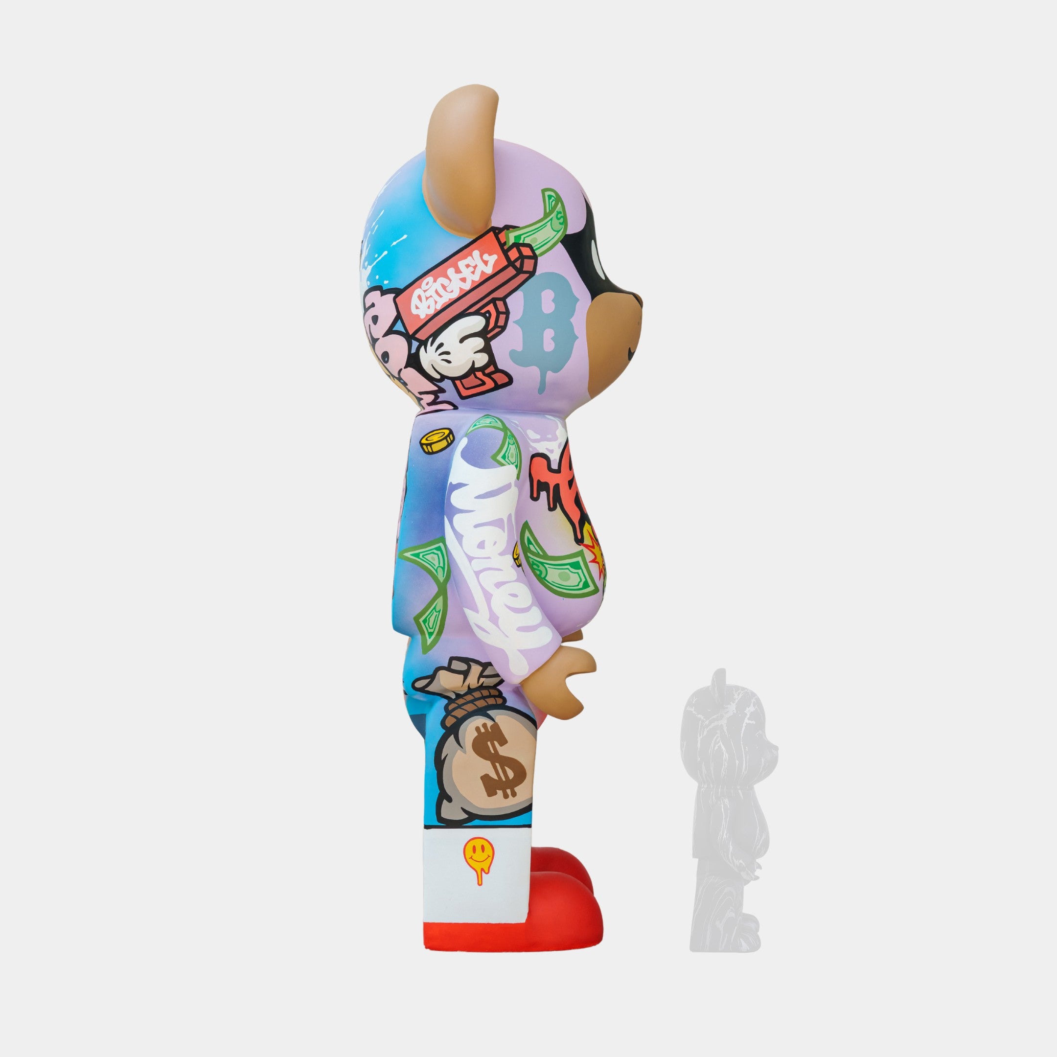 The Lucky Paws Bear Sculpture - 165cm by Giant Sculptures captures Thai street art with vibrant graffiti-style designs, money and cartoon symbols, a cartoon bear profile with red shoes, and includes a smaller translucent version in front.