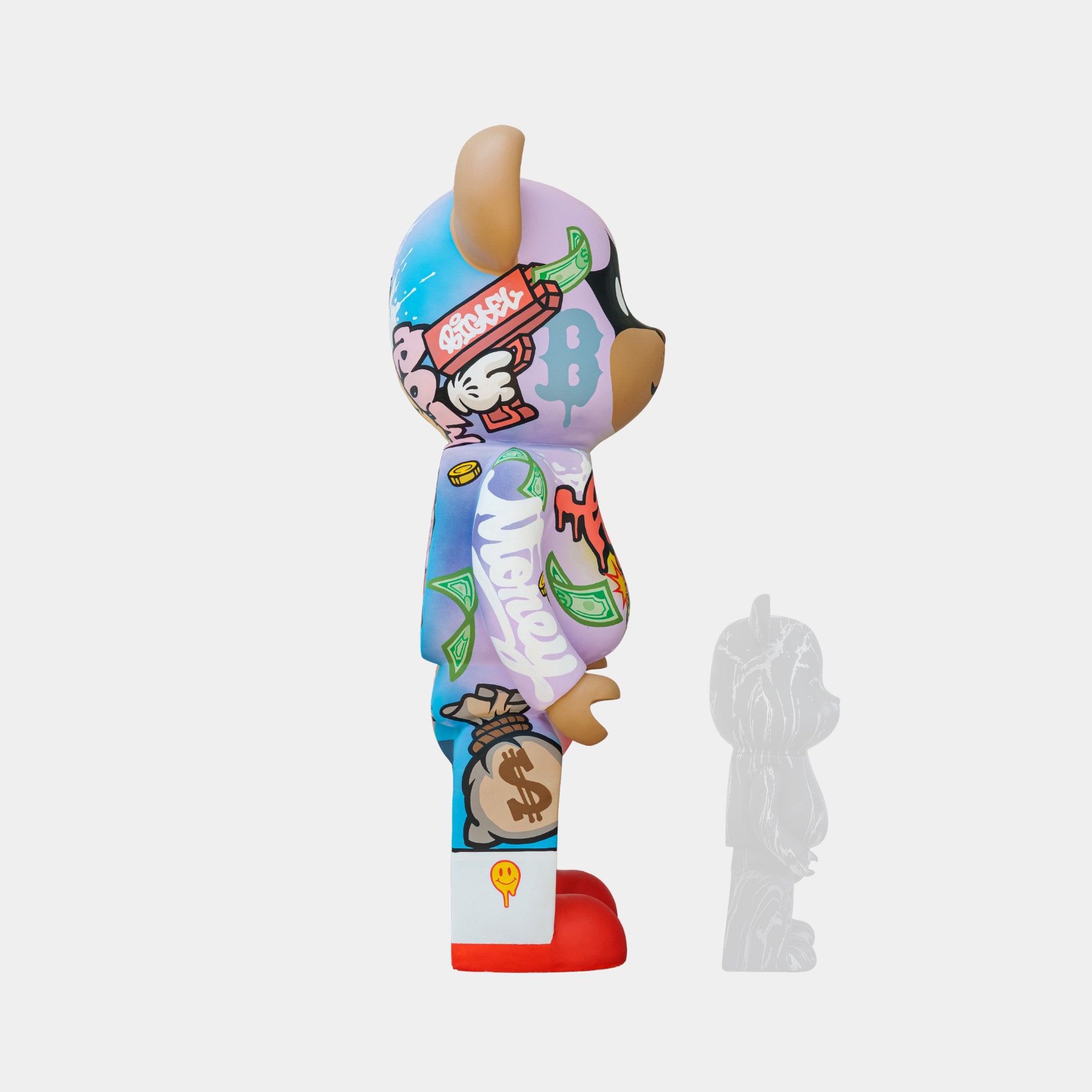 The Giant Sculptures Lucky Paws Bear Sculpture - 135cm features a vibrant, cartoon-like design. It includes graffiti elements like Mickey Mouse hands, dollar bills for prosperity and protection, a smiley face, and red shoes. An outlined similar figure is visible on the right.
