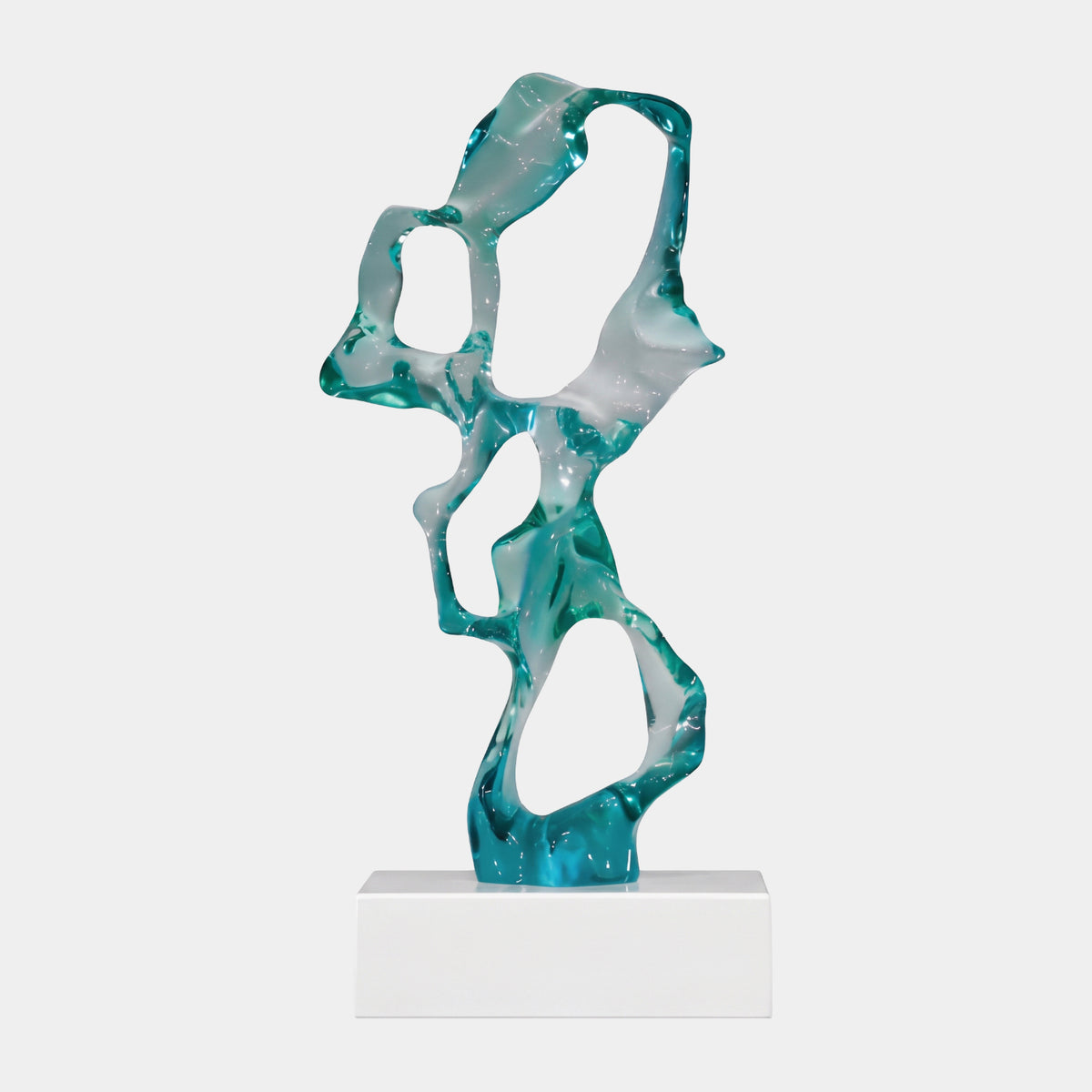 Teal Pierced Scholar's Rock Resin Sculpture, 47cm, a pierced Taihu-style form in sea teal to frosted tones on a white marble base, plain light background.