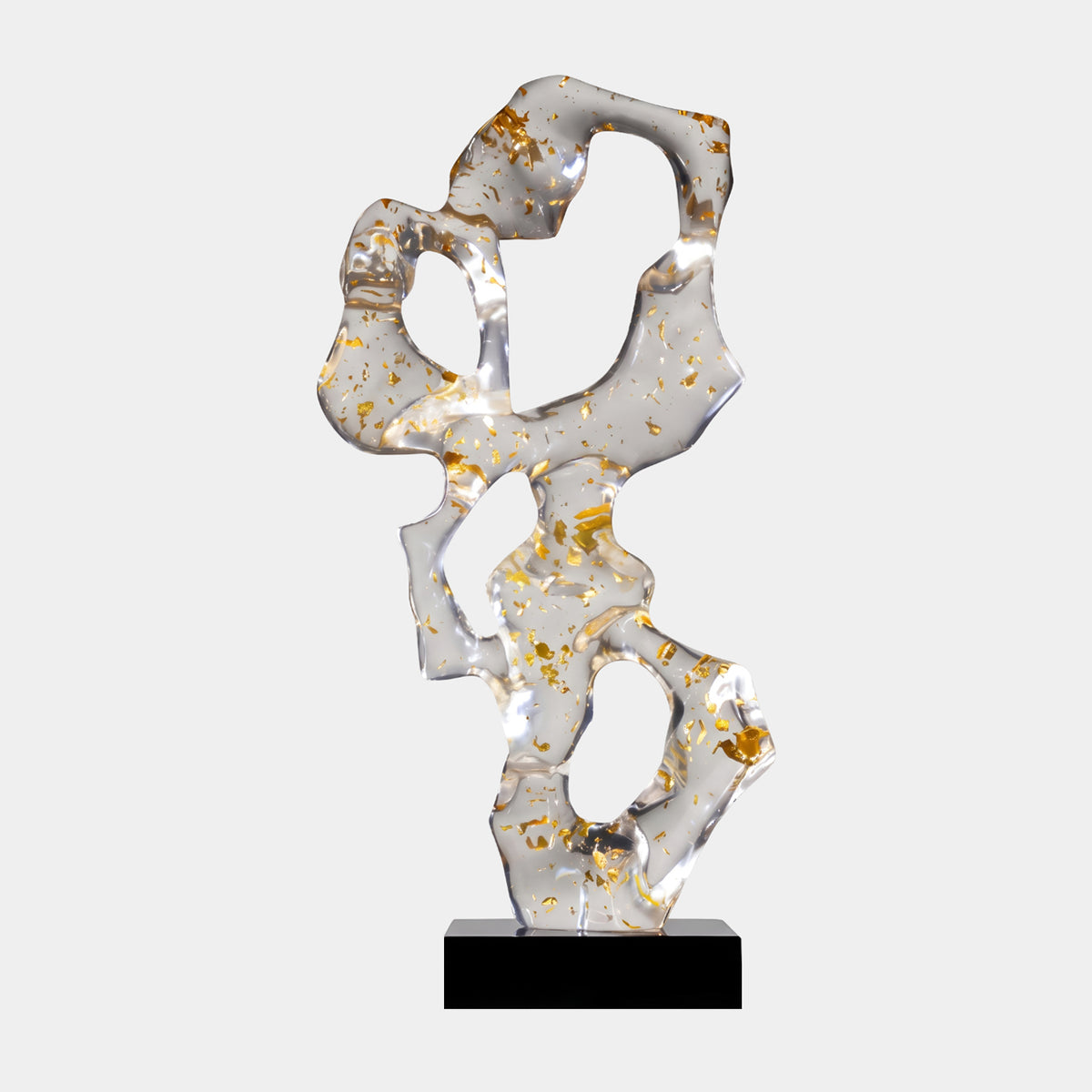 Clear Gold Leaf Pierced Ribbon Resin Sculpture - 83cm, an abstract ribbon-form sculpture with gold leaf flakes on a black marble base, shown against a plain light background.