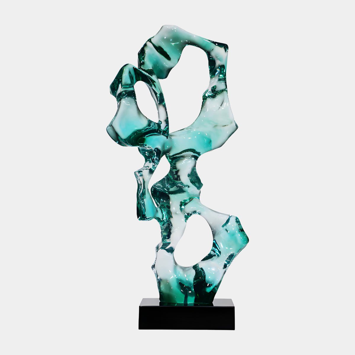 Teal Pierced Upright Ribbon Resin Sculpture (83cm) by Giant Sculptures, a swirled teal and clear resin ribbon with four pierced openings on a black marble base, shown against a plain white background.