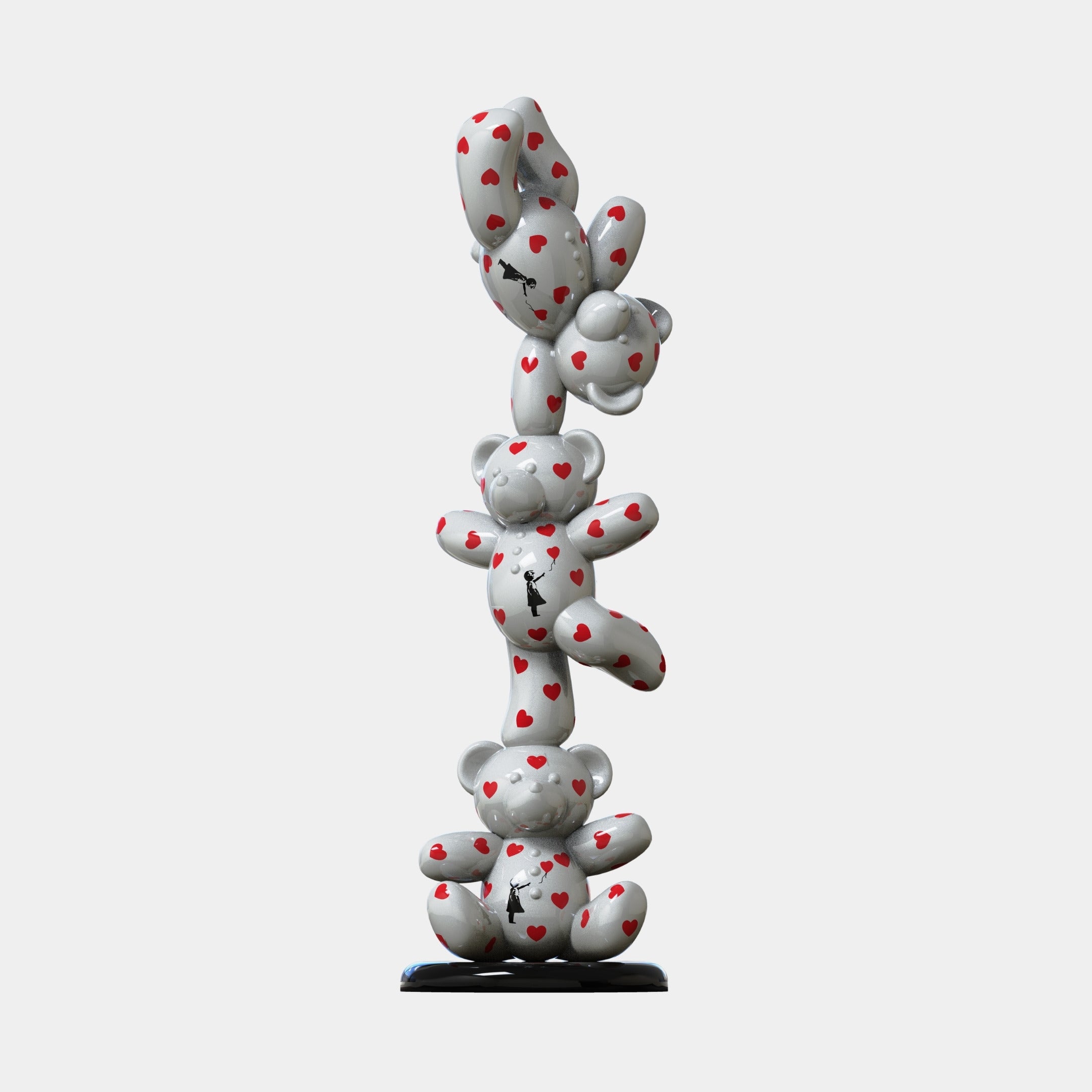 The Gacko Banksy Triple Bear Sculpture by Giant Sculptures stands 90cm tall, featuring three white teddy bears stacked vertically with red hearts and black arrows, echoing contemporary street art on a plain white background.