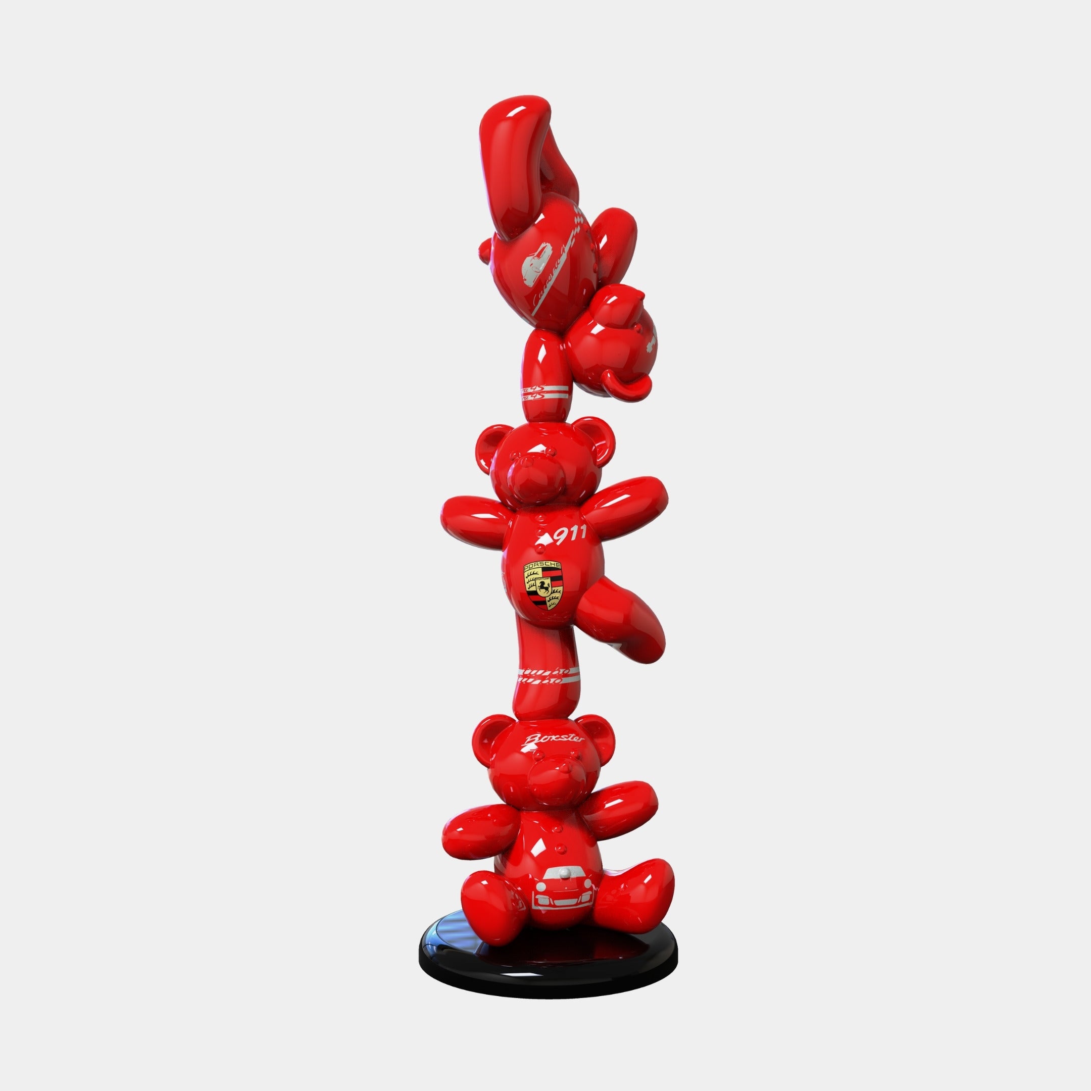 The Gacko Porsche Triple Bear Sculpture - 90cm by Giant Sculptures features three shiny red bears with motorsport-inspired designs, stacked vertically on a round black base against a plain white background.