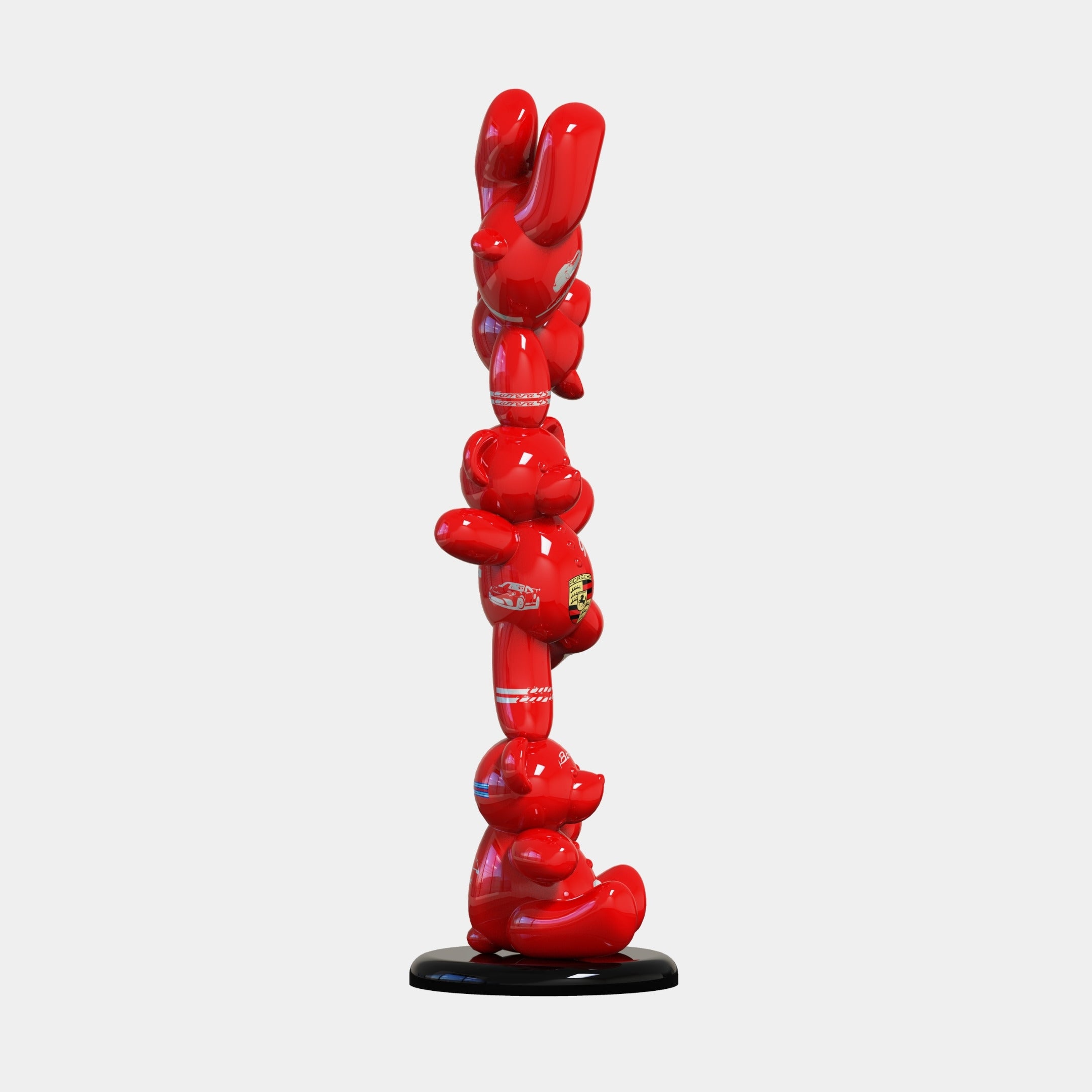 The Gacko Porsche Triple Bear Sculpture by Giant Sculptures showcases three glossy red, cartoon-like bears stacked vertically on a black base, capturing a playful contemporary pop style in a striking 90cm display.
