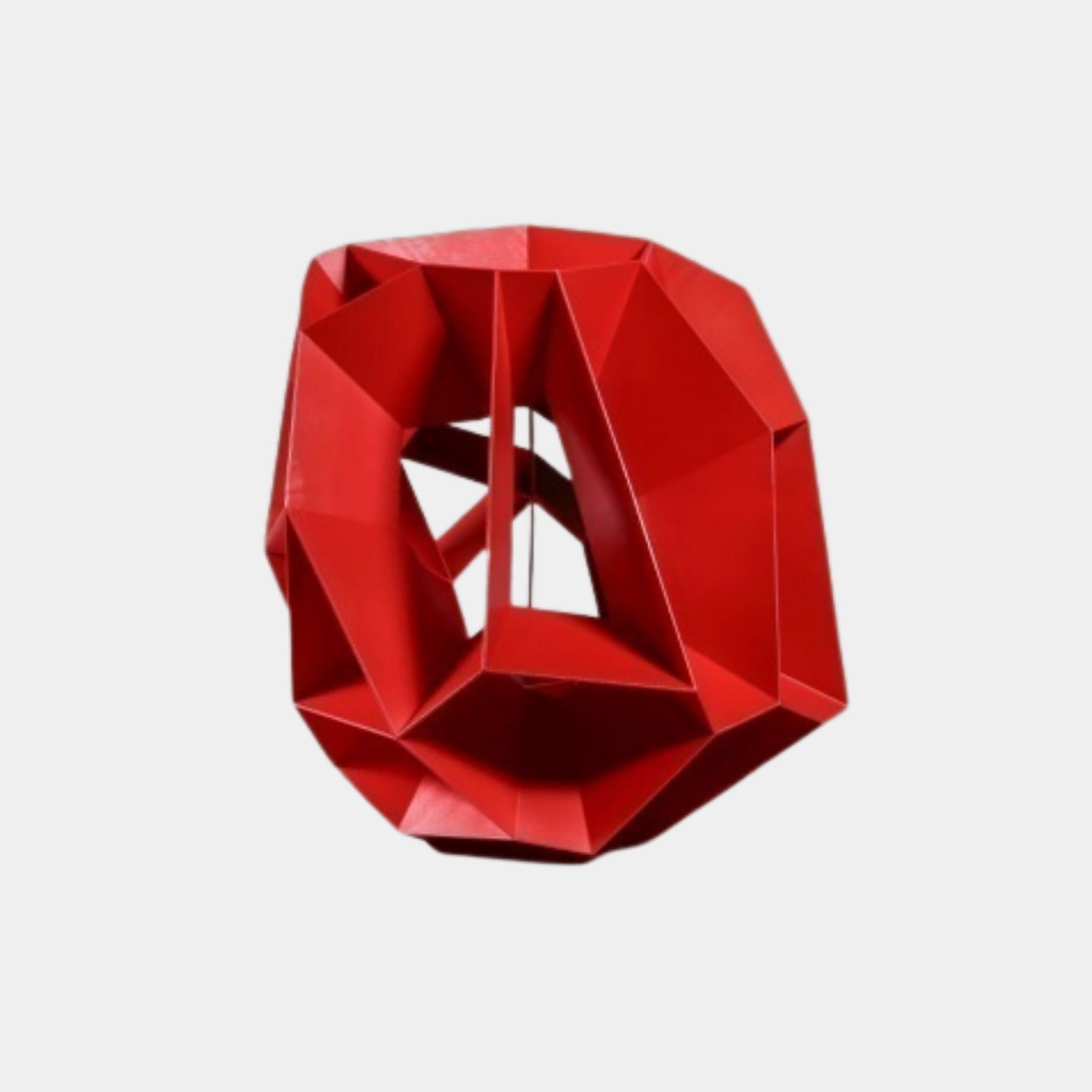 Red Geometric Faceted Metal Sculpture by Giant Sculptures, 55cm, with angular powder-coated panels forming an open faceted structure, shown on a plain background.